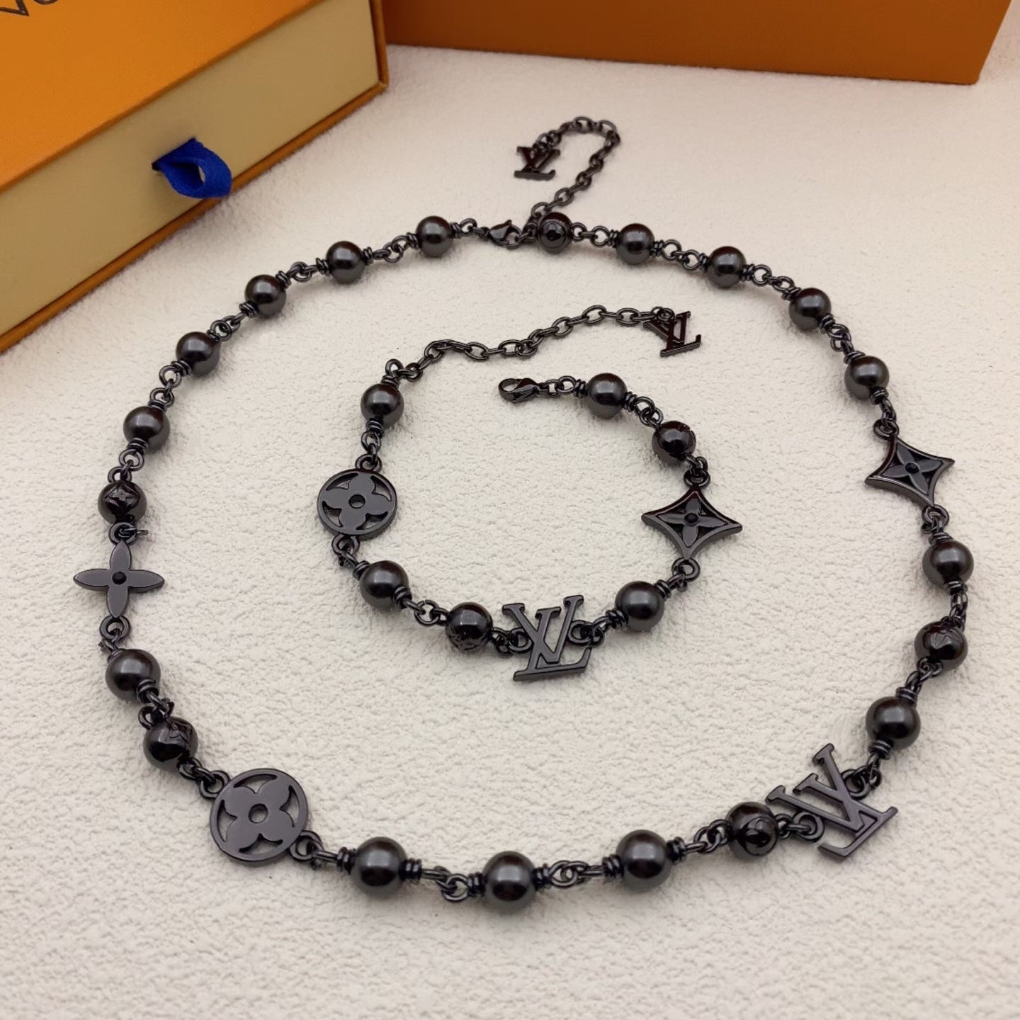 Louis Vuitton Pearl & Charm Jewelry Collection – Elegant Necklaces & Bracelets with LV Motifs