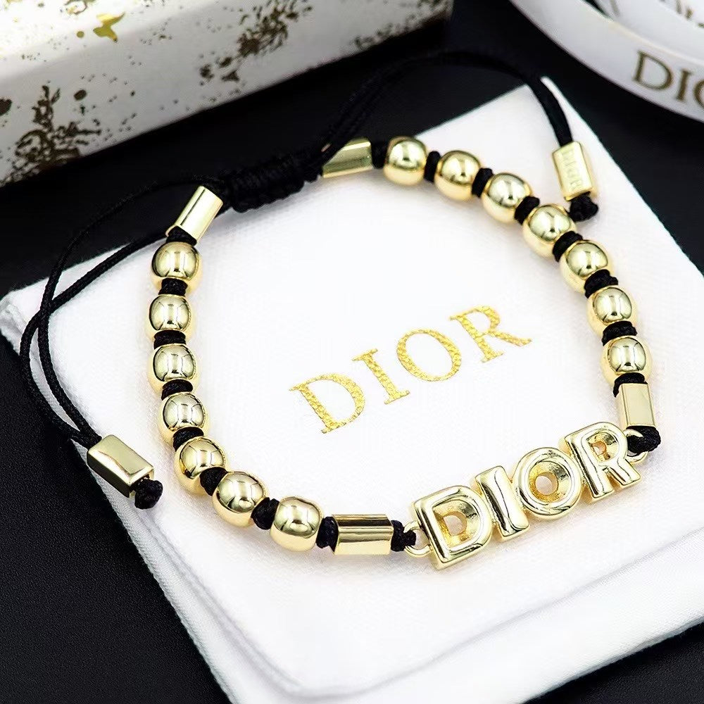 Dior Adjustable Beaded Bracelet – Gold Letter Beads on Black Cord with Logo Accent