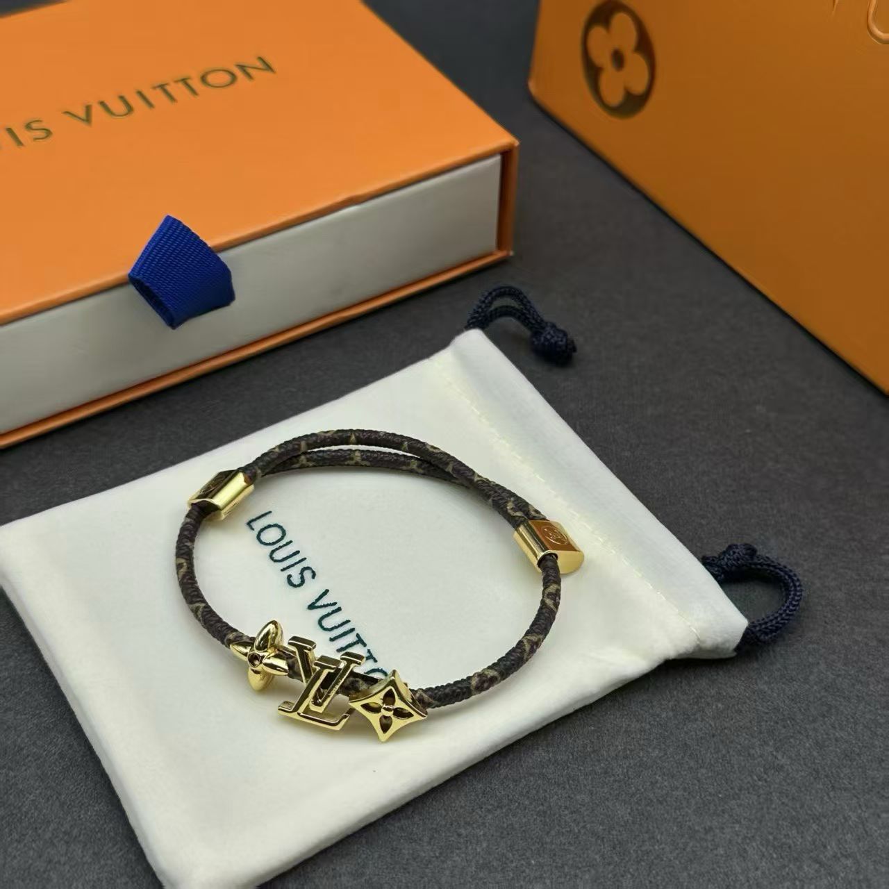 Louis Vuitton Braided Monogram Bracelet – Double Cord with Gold LV Logo & Flower Charms