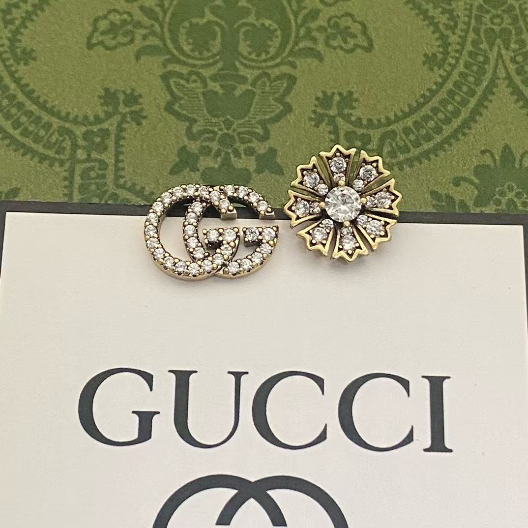 Gucci Earring Set – Gold-Tone GG Rhinestone Emblem & Floral Gem Accent