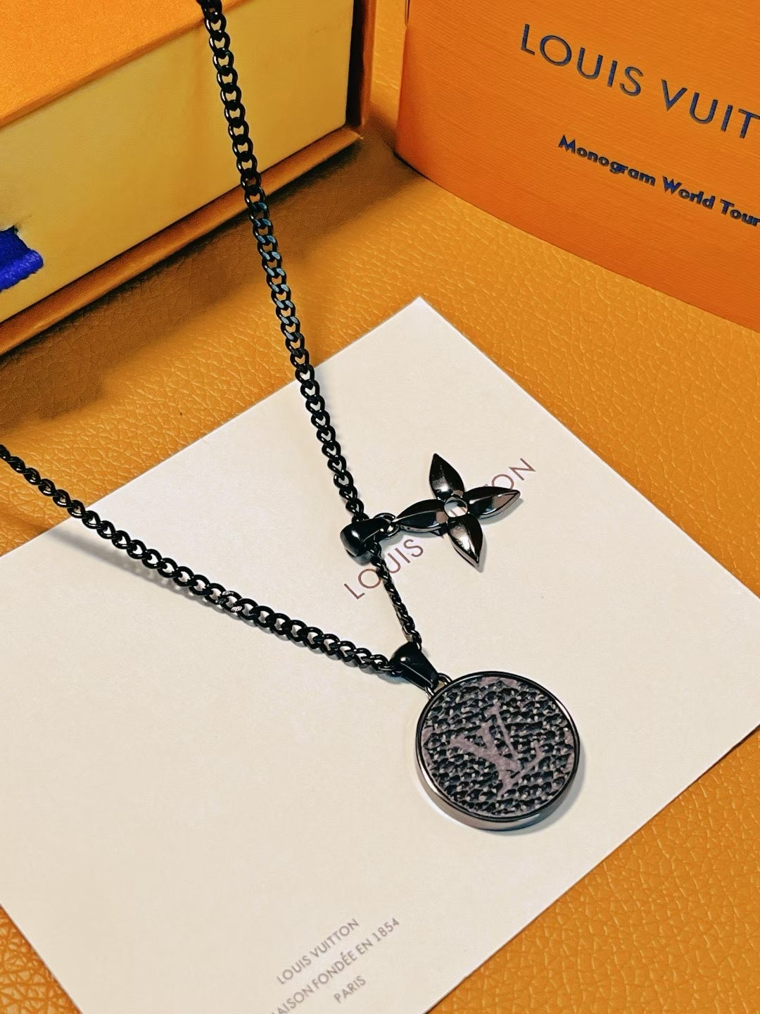 Louis Vuitton Black Medallion & Flower Charm Necklace – Monogram World Tour Edition