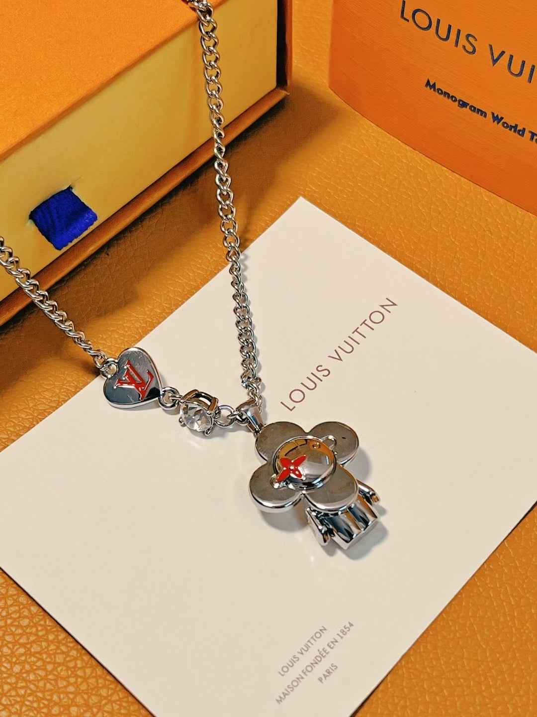 Louis Vuitton Heart & Character Charm Necklace – Silver Chain with Iconic Motifs