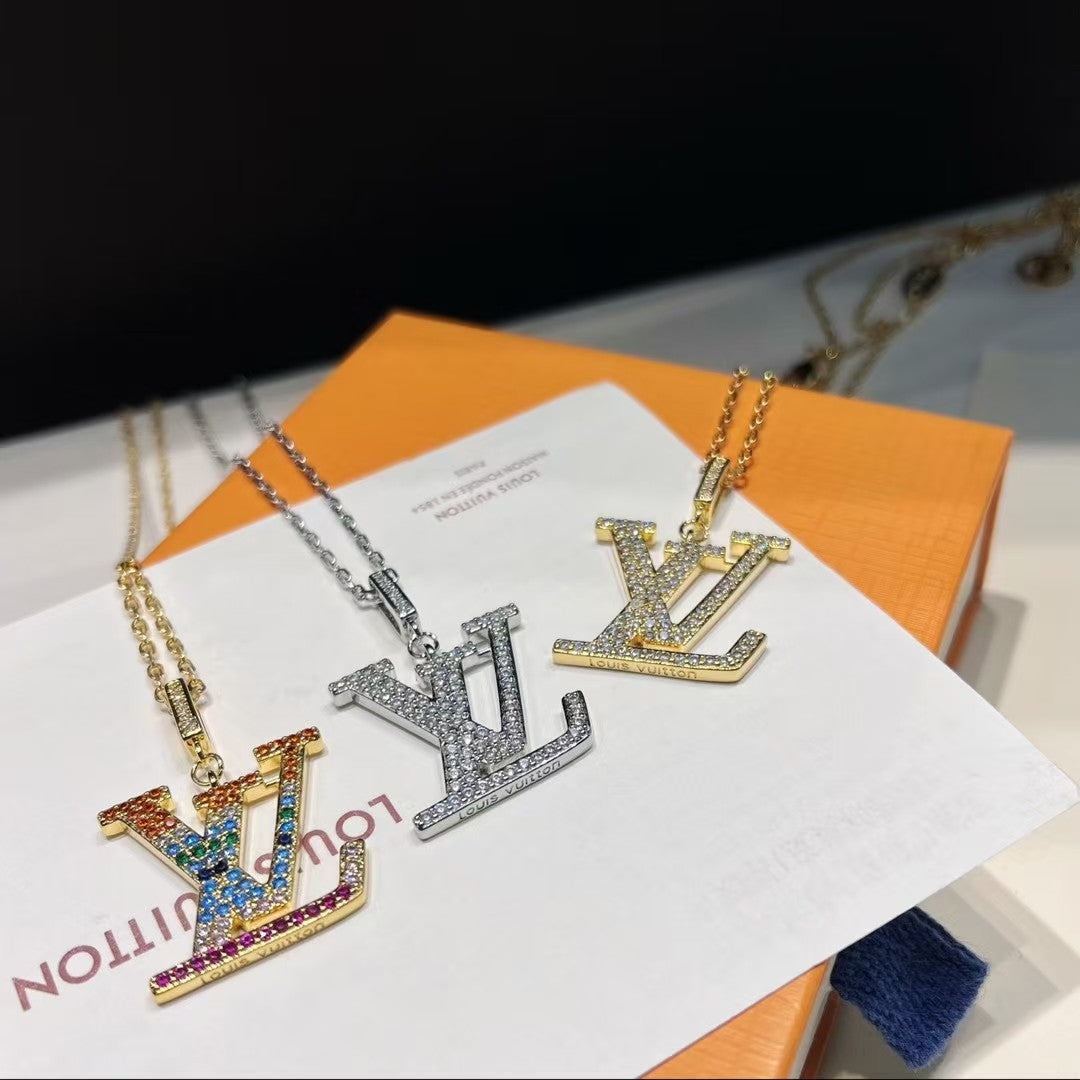 Louis Vuitton LV Pendant Necklace Trio – Gold & Silver Chains with Gem-Encrusted Logo Pendants