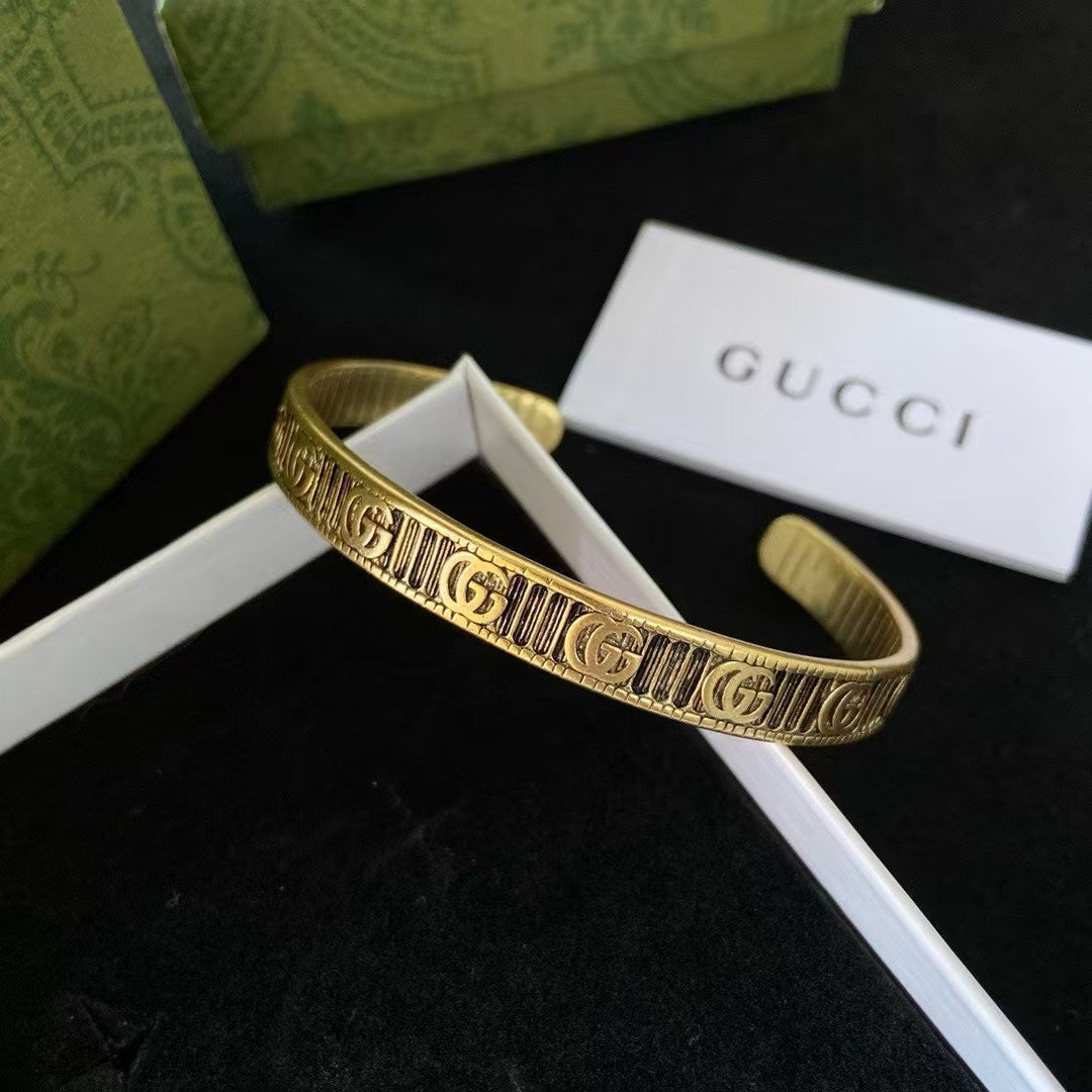Gucci Cuff Bracelet Double G Motif – Engraved Striped Gold Brass