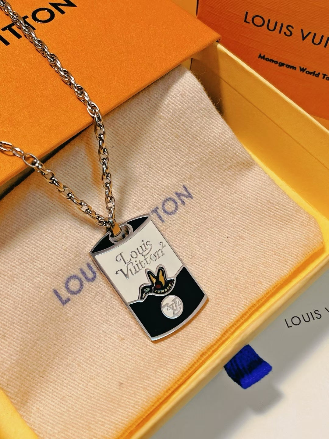 Louis Vuitton TUMAD Butterfly Pendant Necklace – Silver Chain with Engraved Monogram