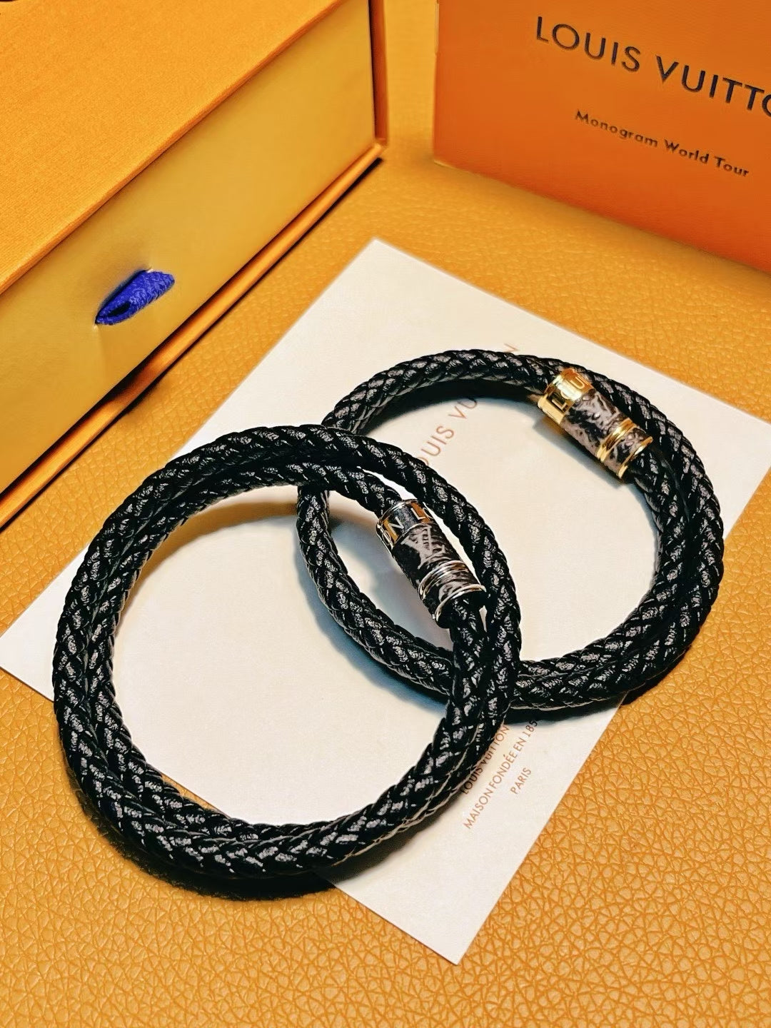Louis Vuitton Braided Leather Bracelet Duo – Black Leather with Signature Metallic Clasps