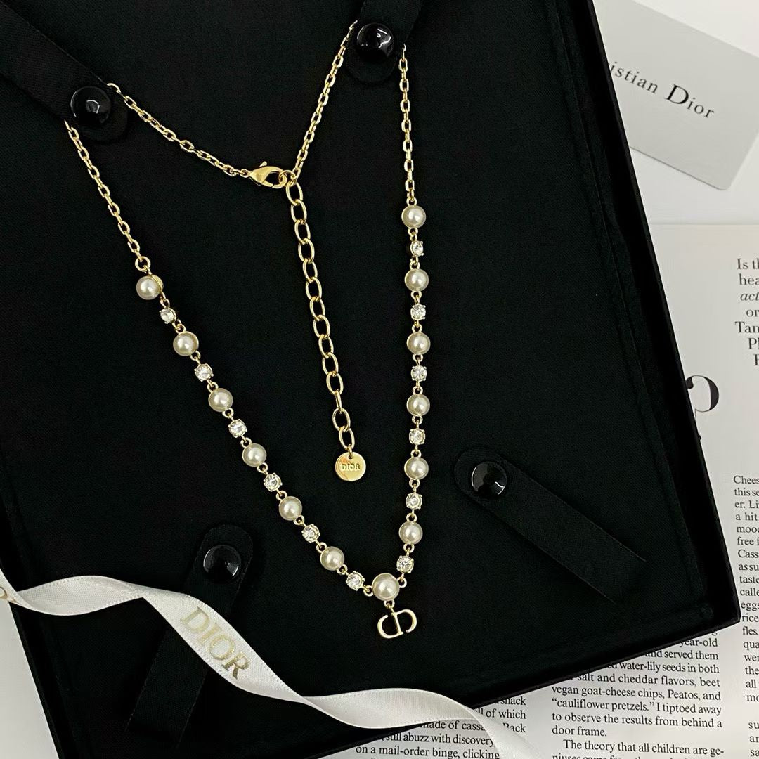 Dior-Inspired Pearl Necklace – Gold Chain with CD Logo Pendant & Gemstone Details