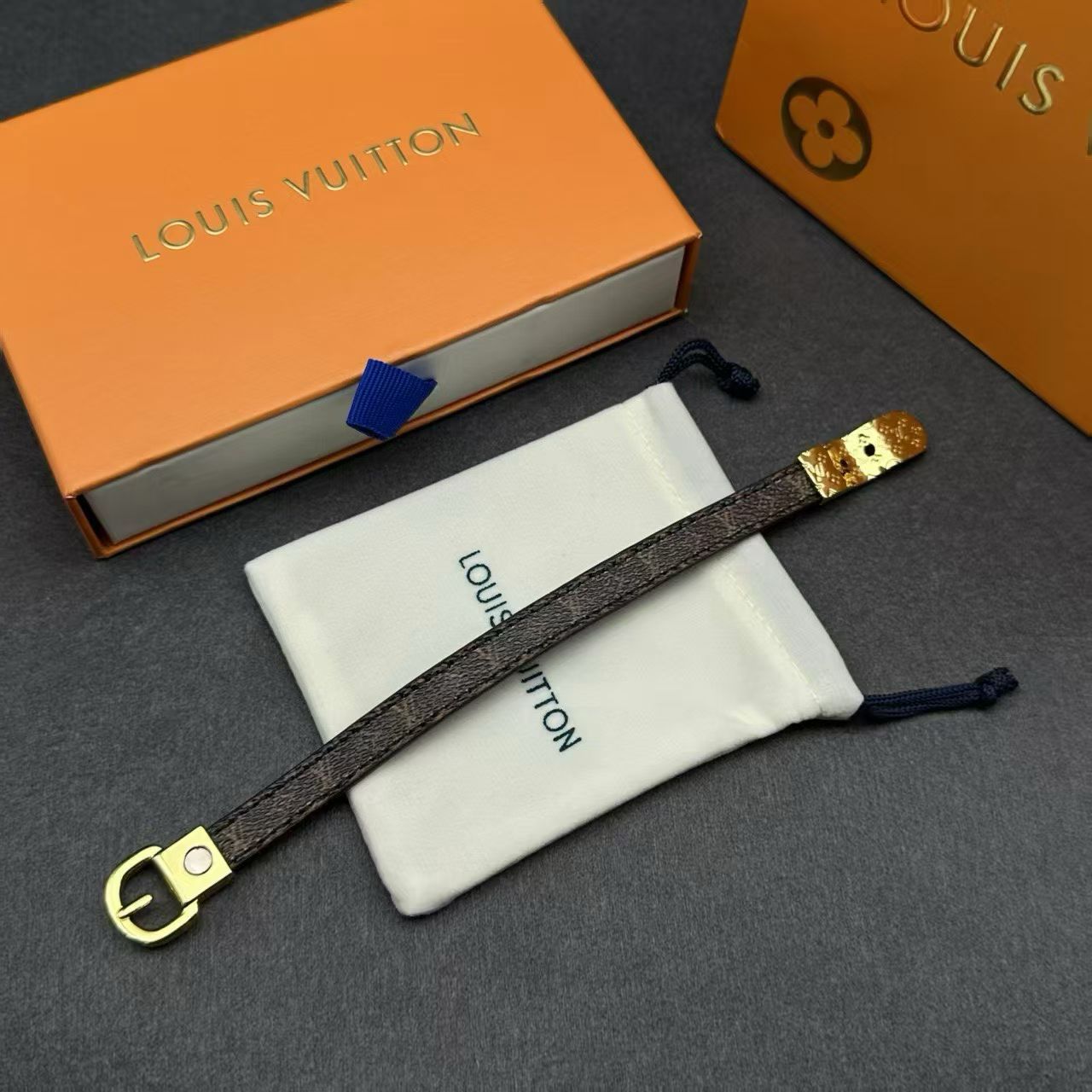 Louis Vuitton Double Buckle Leather Bracelet – Gold-Tone Monogram Clasp