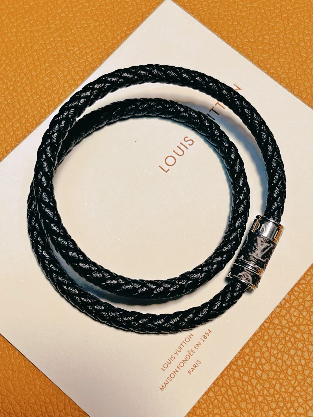 Louis Vuitton Braided Leather Bracelet Duo – Black Leather with Signature Metallic Clasps
