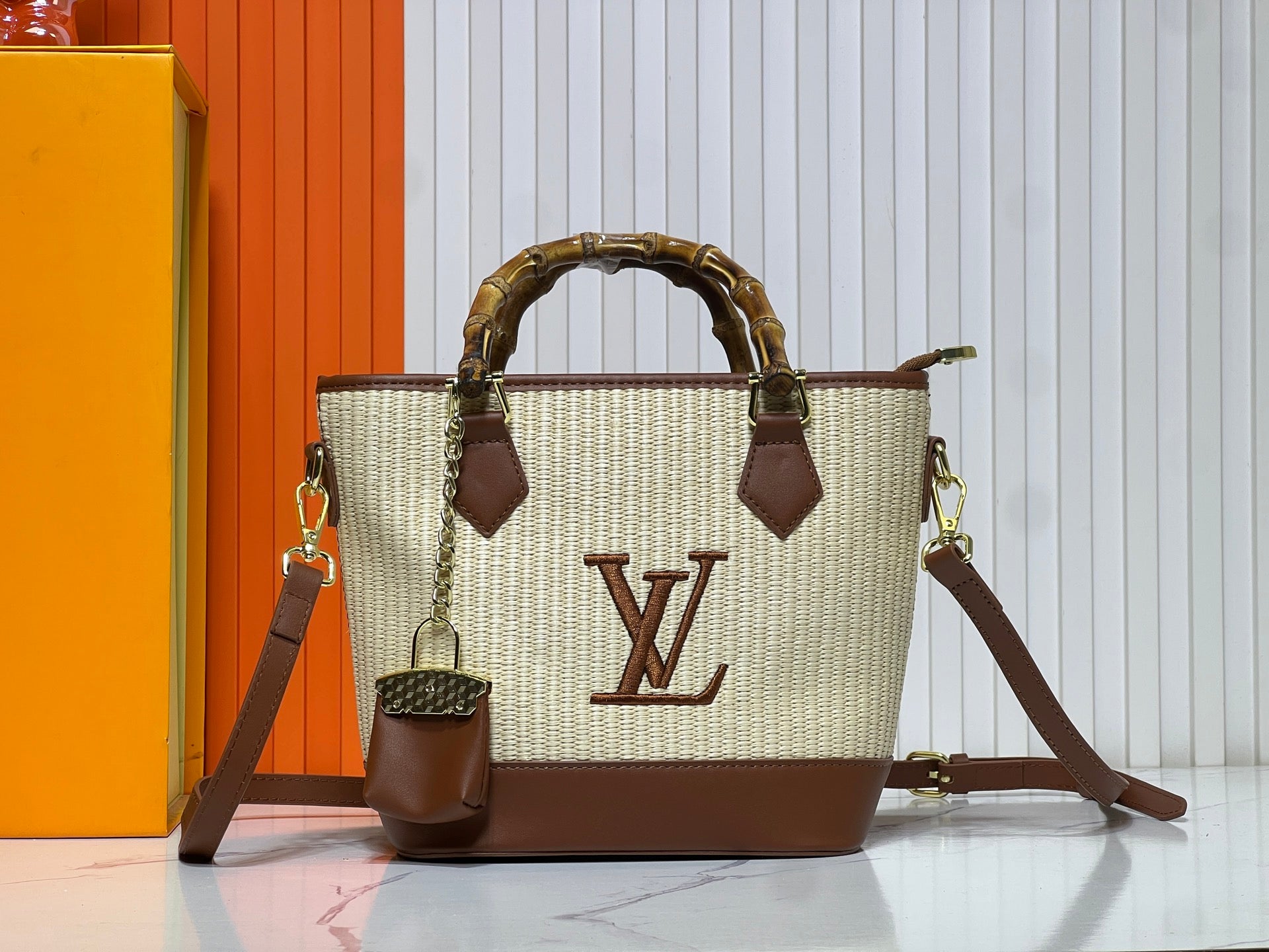 Louis Vuitton Woven Bamboo Handle Handbag Collection