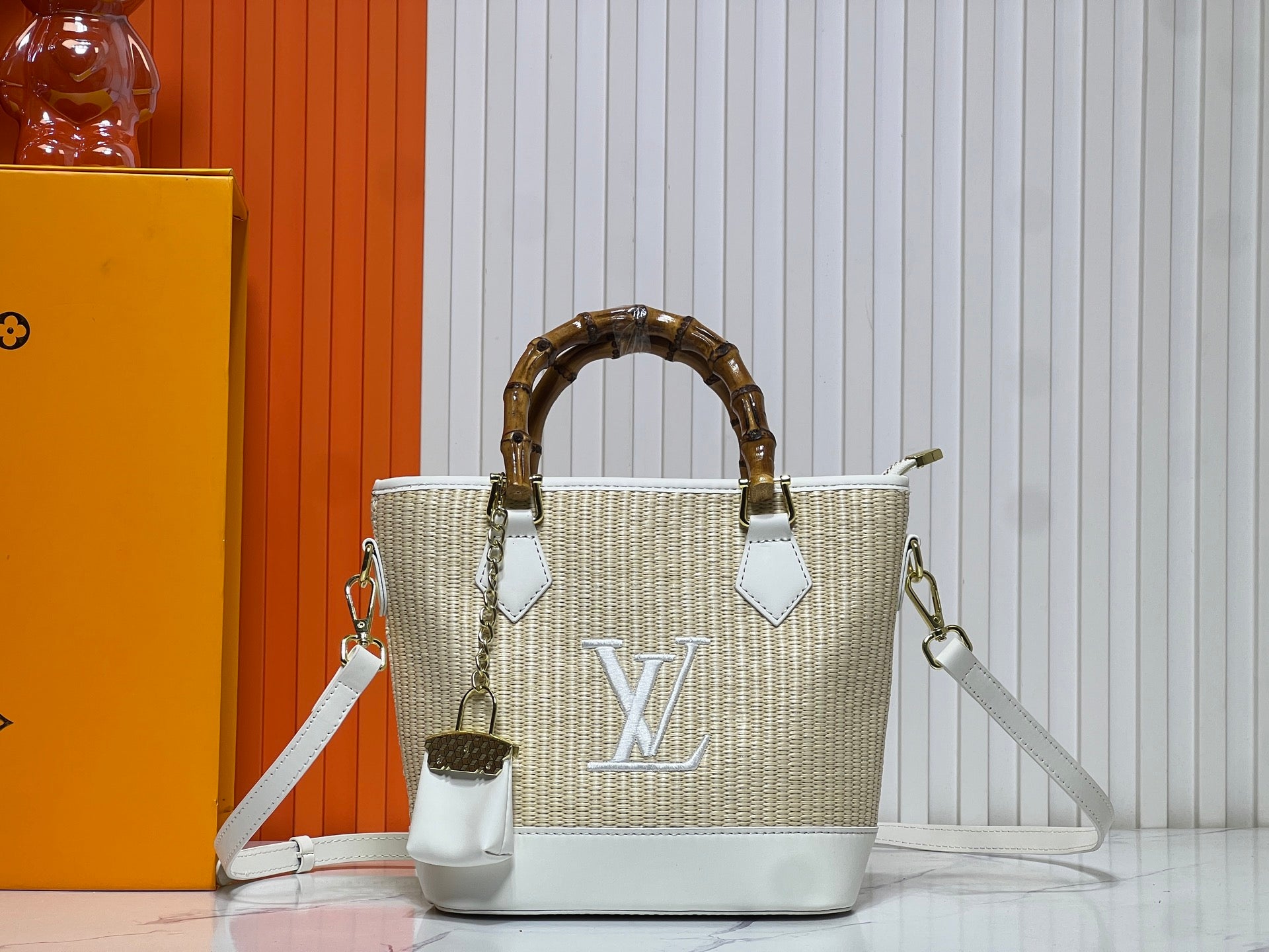 Louis Vuitton Woven Bamboo Handle Handbag Collection
