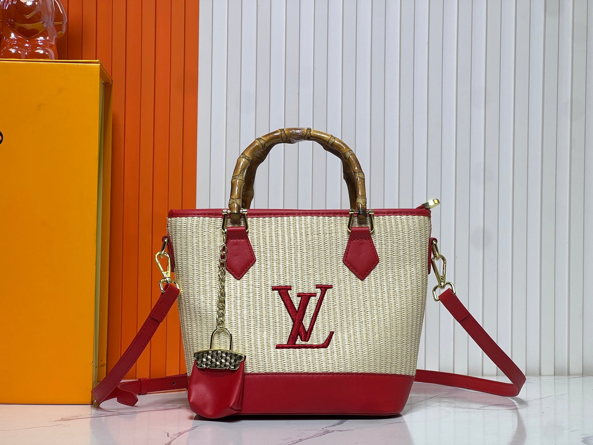 Louis Vuitton Woven Bamboo Handle Handbag Collection