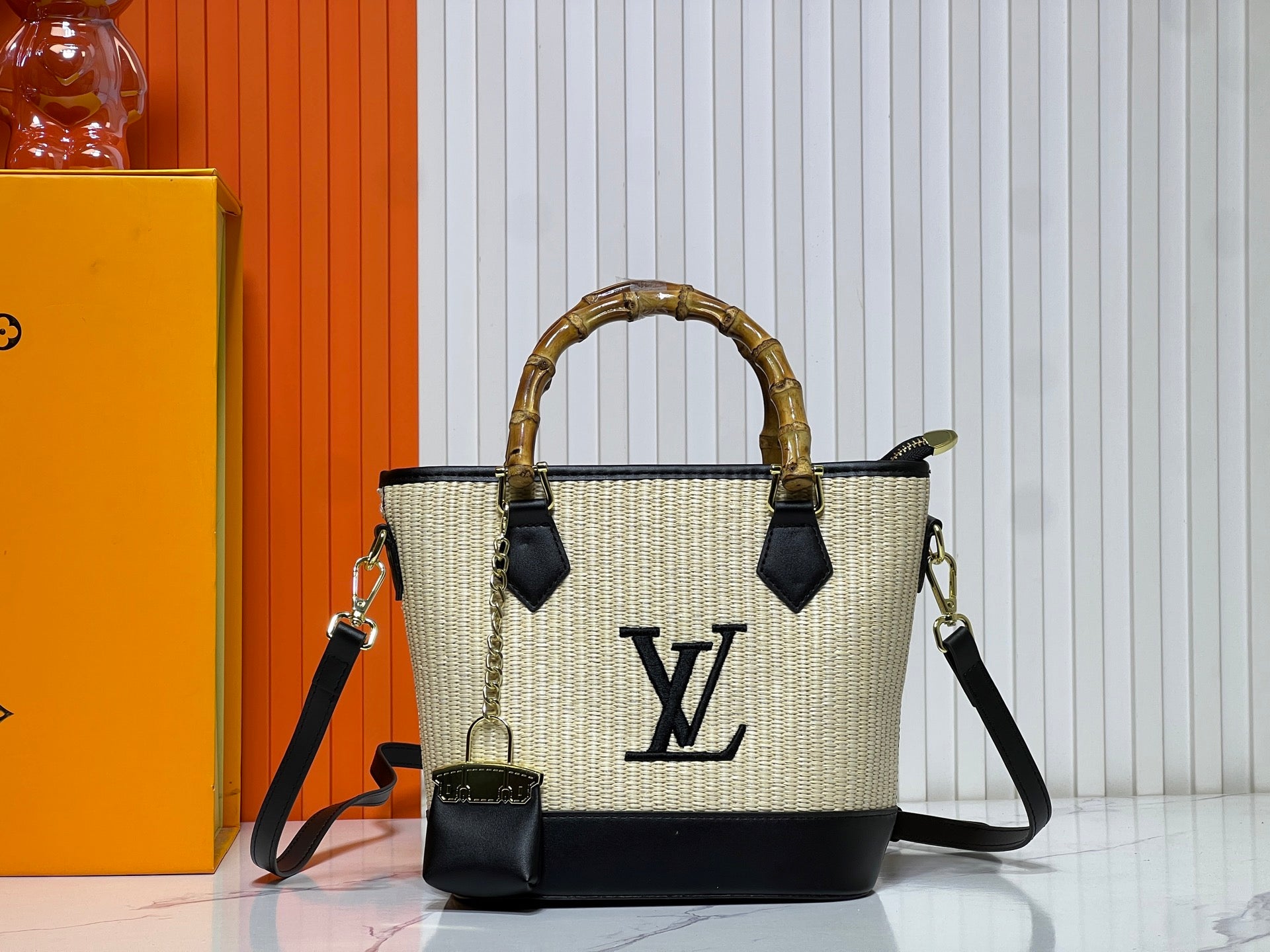 Louis Vuitton Woven Bamboo Handle Handbag Collection