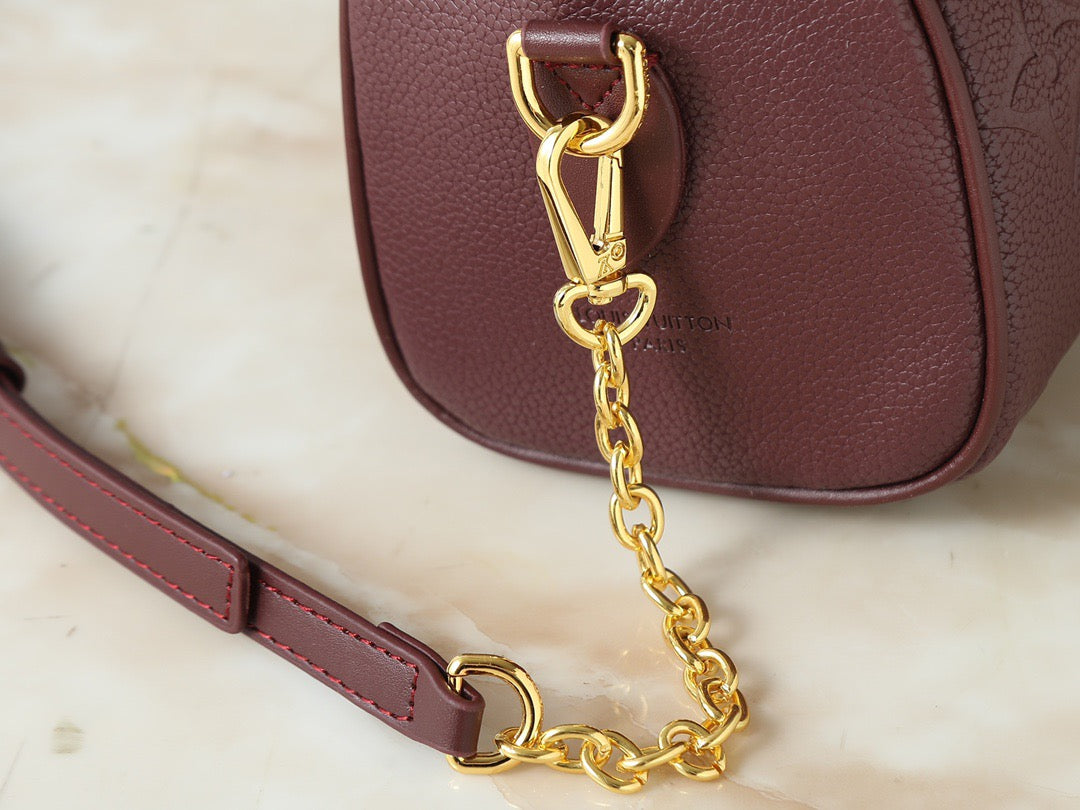 Louis Vuitton Embossed Monogram Handbag – Burgundy Luxe Edition