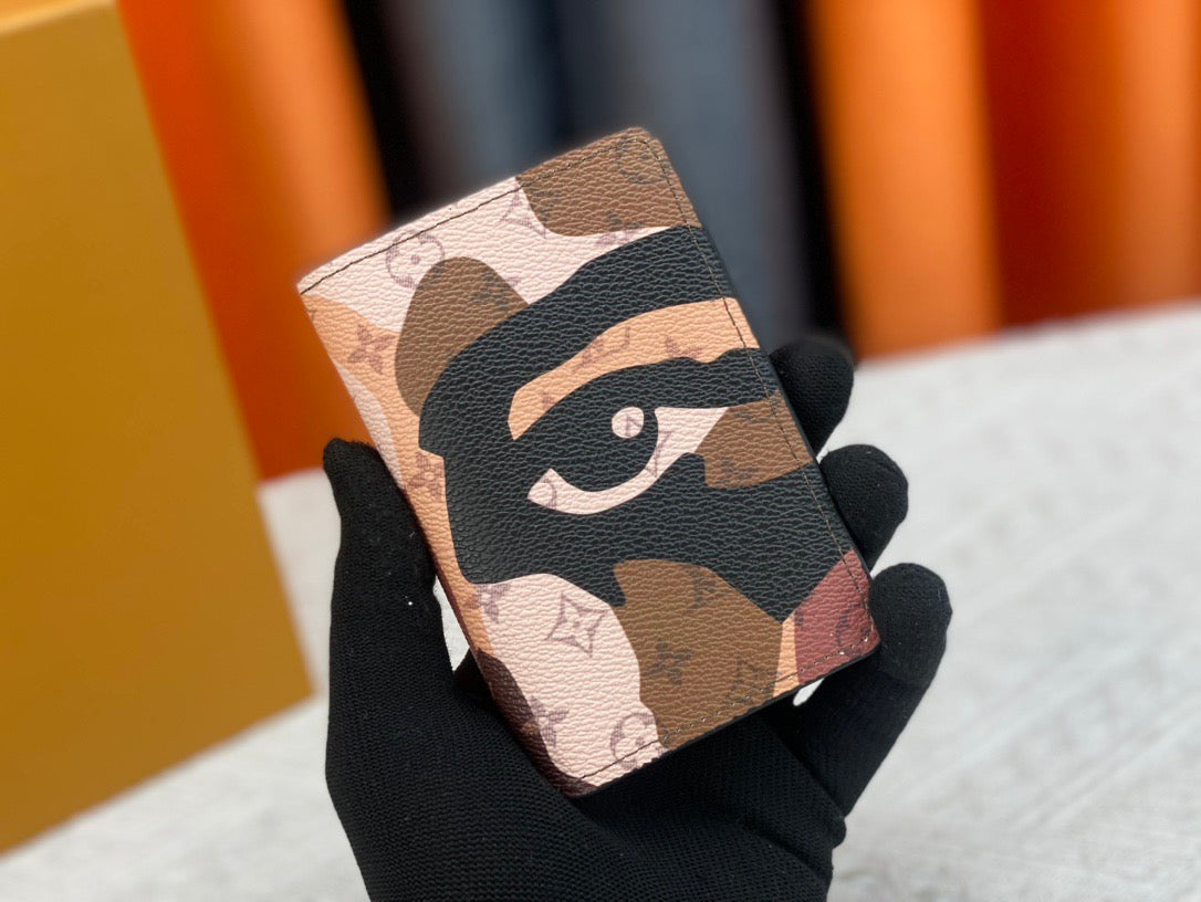 Louis Vuitton Monogram Cardholder Artistic Eye Motif & Abstract Design