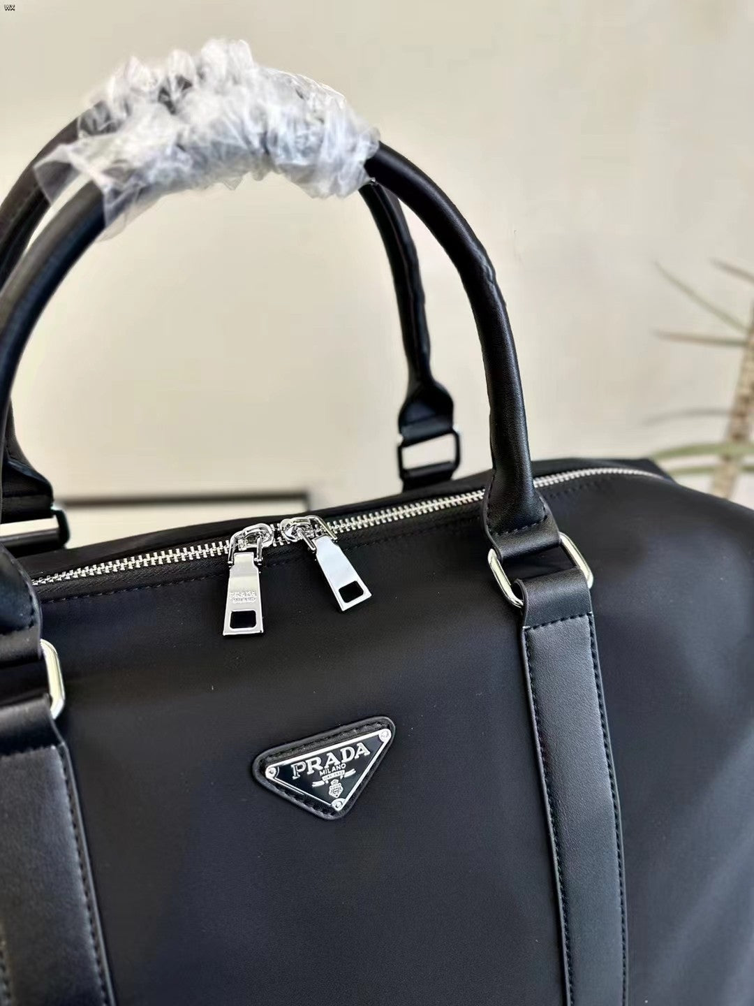 Prada Nylon Duffle Bag Size 47cm – Structured Design with Leather Accents & Silver Hardware