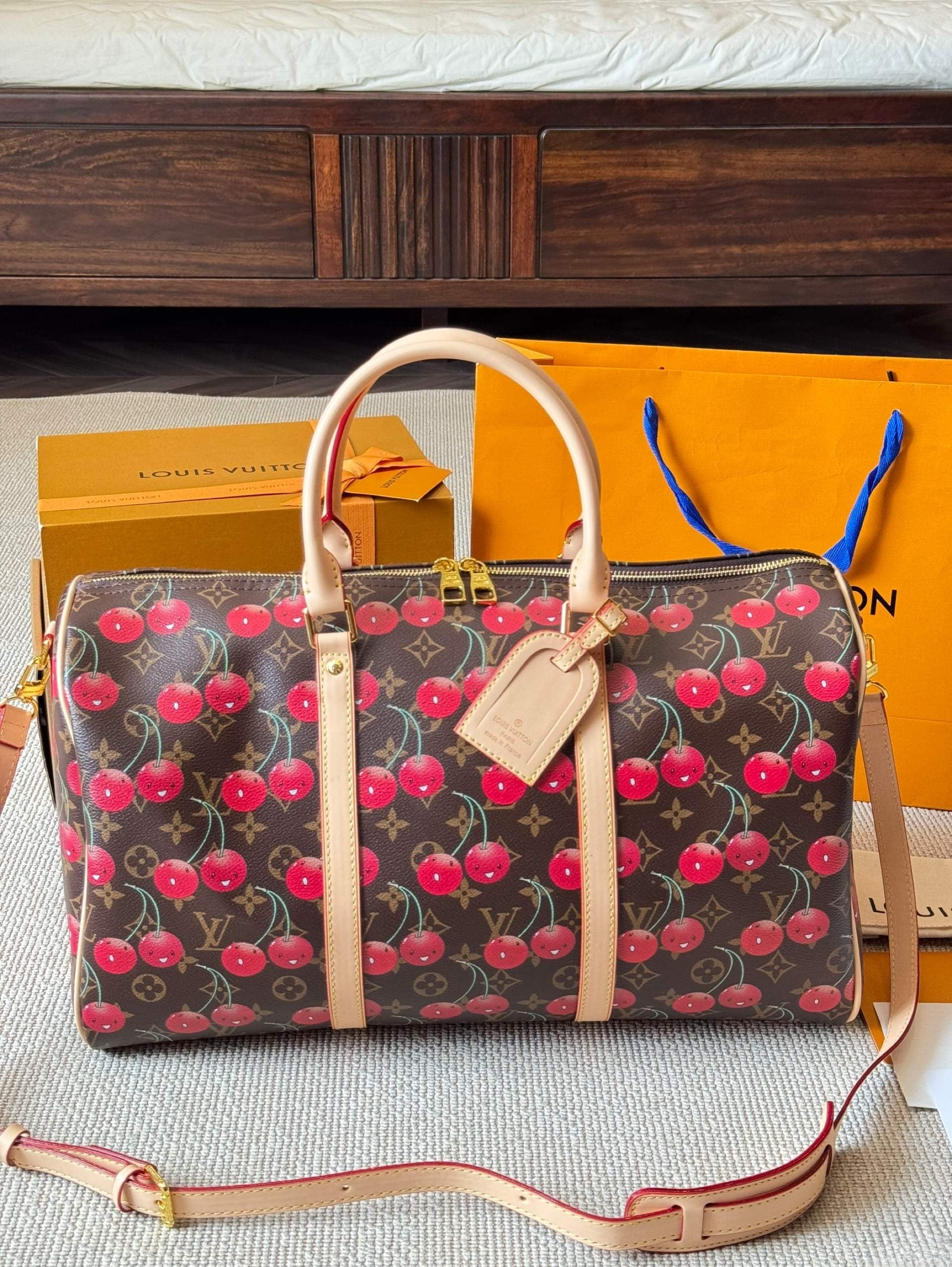 Louis Vuitton Keepall Bandoulière 45 – Cherry Print Monogram Canvas with Gold Hardware