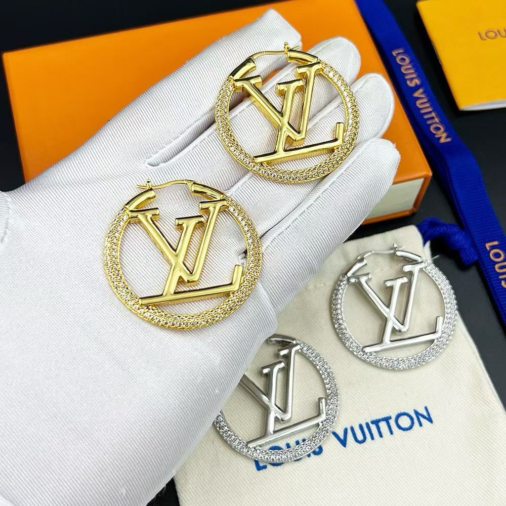 Louis Vuitton Oversized Hoop Earrings – Textured Circular Frame with LV Logo in Gold & Silver