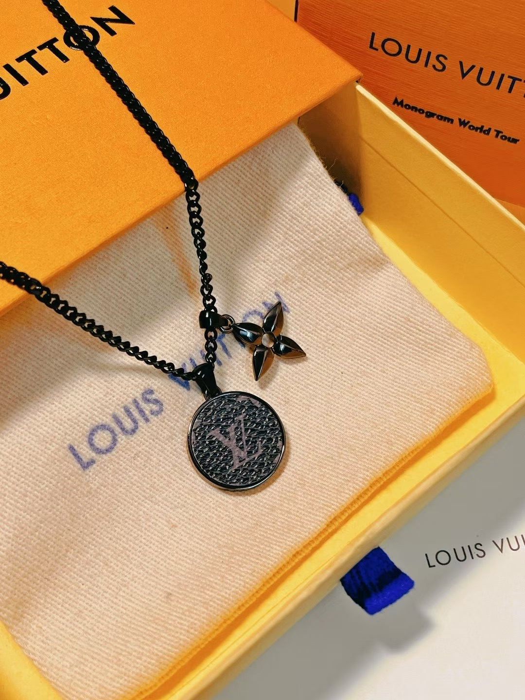 Louis Vuitton Black Medallion & Flower Charm Necklace – Monogram World Tour Edition