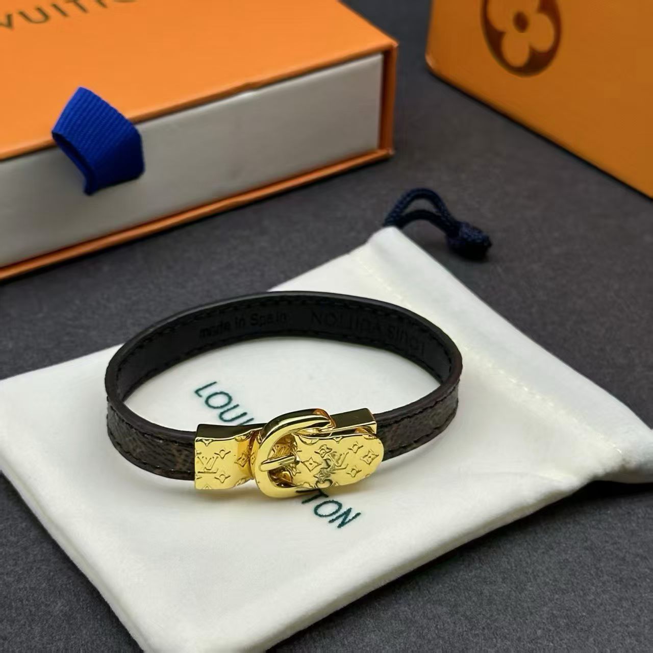 Louis Vuitton Double Buckle Leather Bracelet – Gold-Tone Monogram Clasp