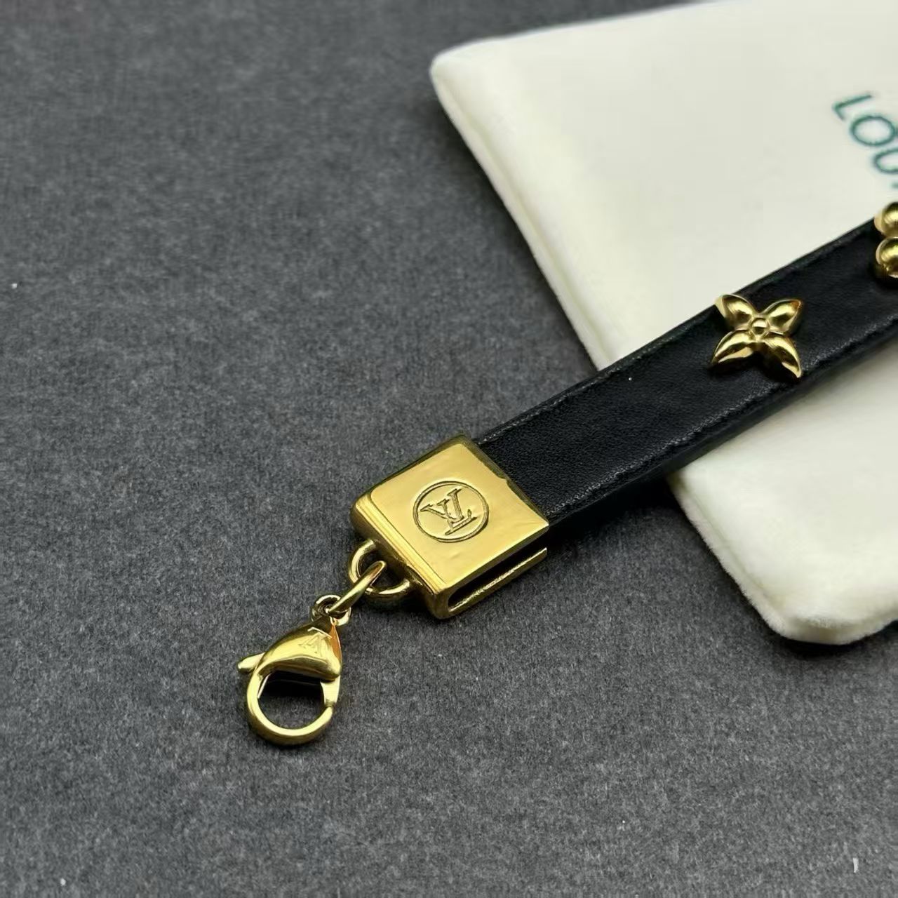 Louis Vuitton Monogram Clover Bracelet – Black Leather with Gold Chain & LV Charm