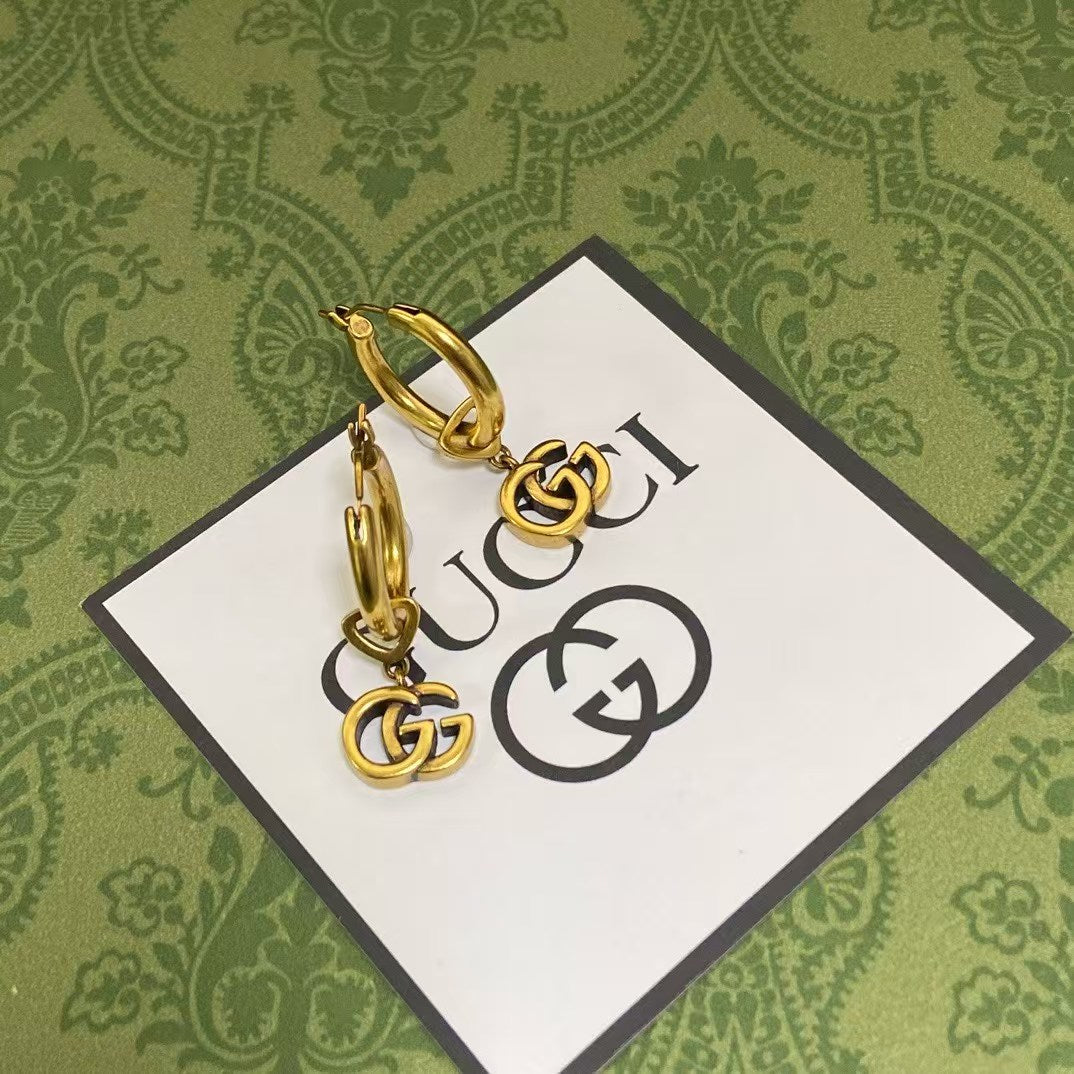 Gucci GG Hoop Earrings – Gold-Tone Hoops with Interlocking GG Logo Charms
