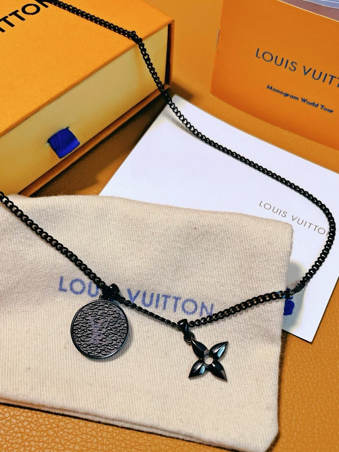 Louis Vuitton Black Medallion & Flower Charm Necklace – Monogram World Tour Edition