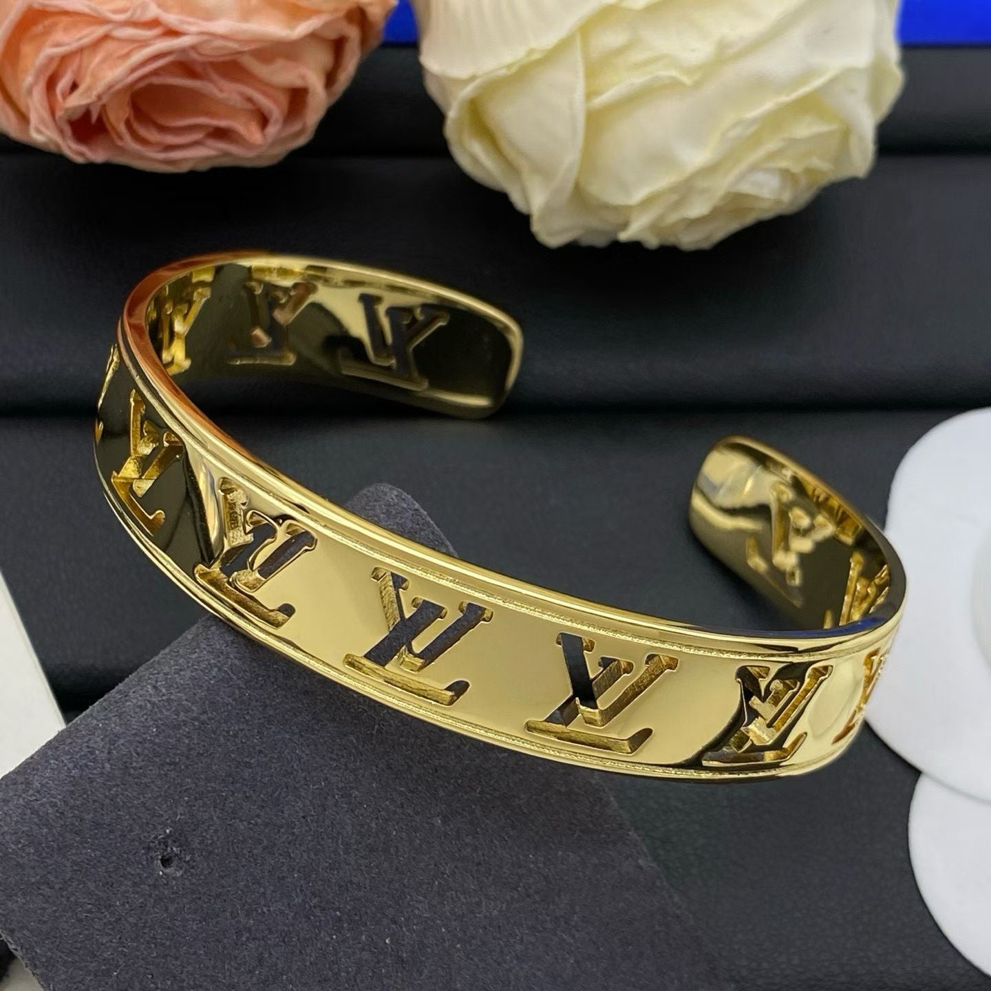 Louis Vuitton Cut-Out Logo Bangle Metallic Bracelet in Silver, Gold & Rose Gold