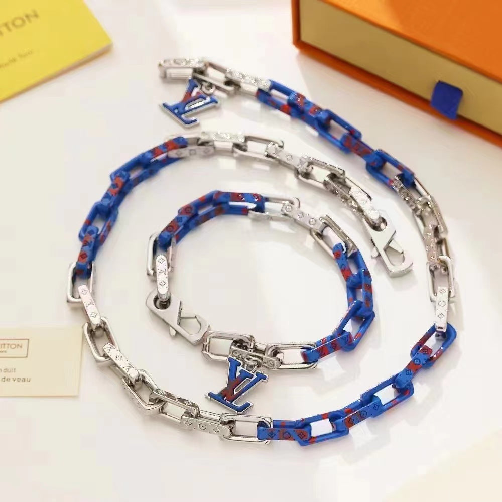 Louis Vuitton Mixed-Metal Chain Necklace – Silver, Gold & Black Links with LV Engraving