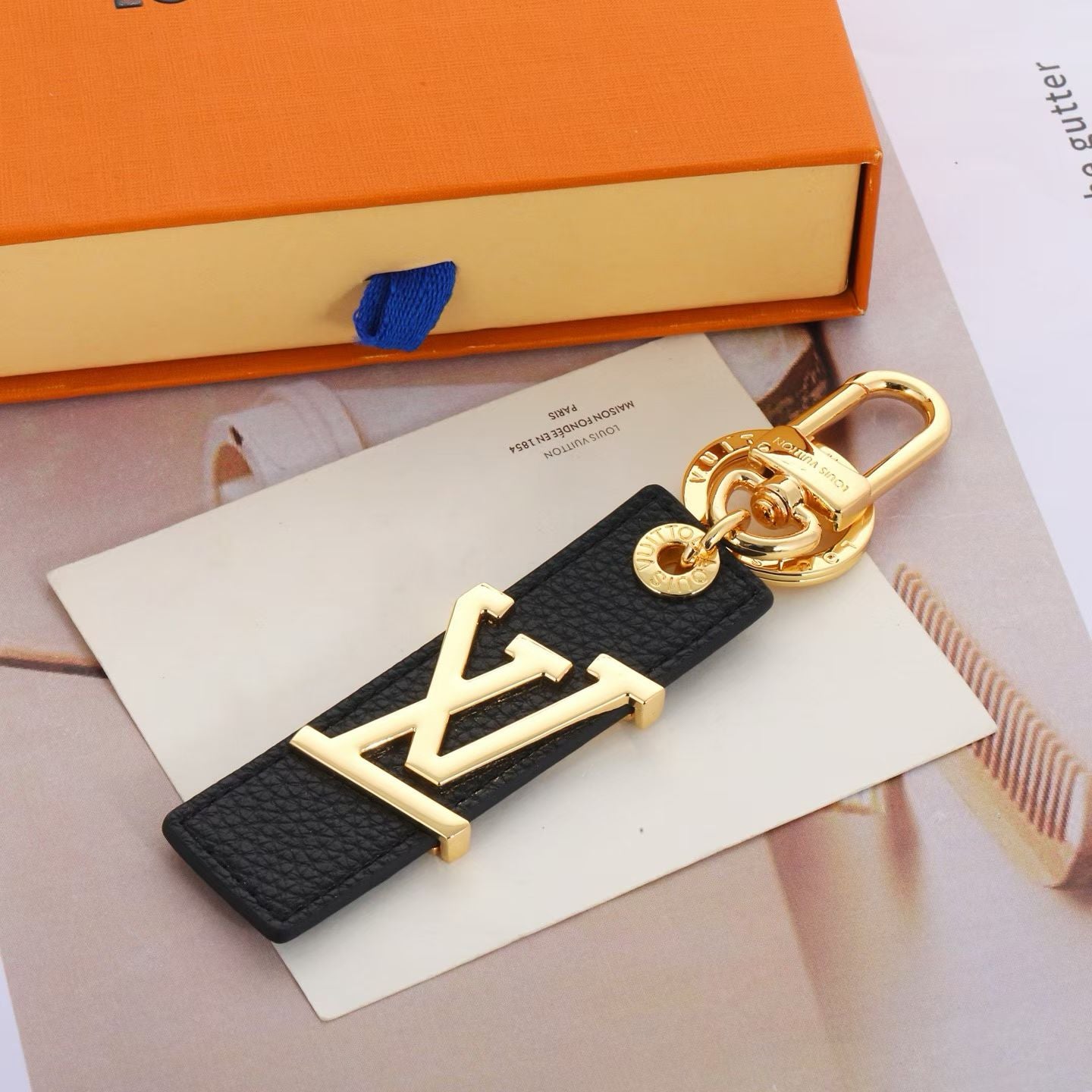 Louis Vuitton LV Logo Keychain – Colorful Leather Strap with Silver Hardware