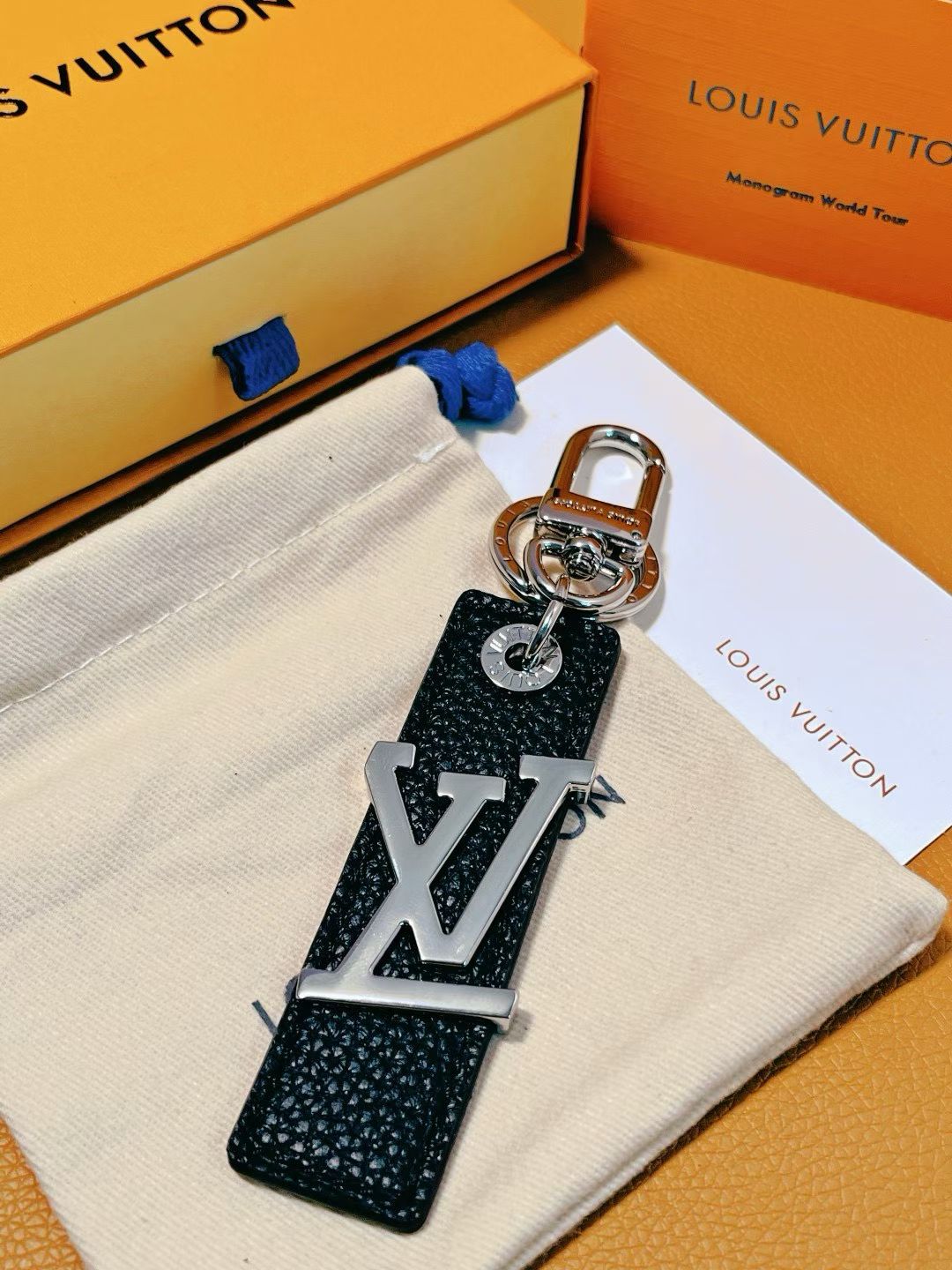 Louis Vuitton LV Logo Keychain – Colorful Leather Strap with Silver Hardware