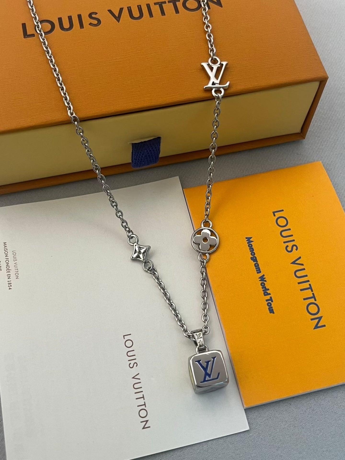 Louis Vuitton Cube & Logo Pendant Necklace – Gold-Tone with Monogram Detailing