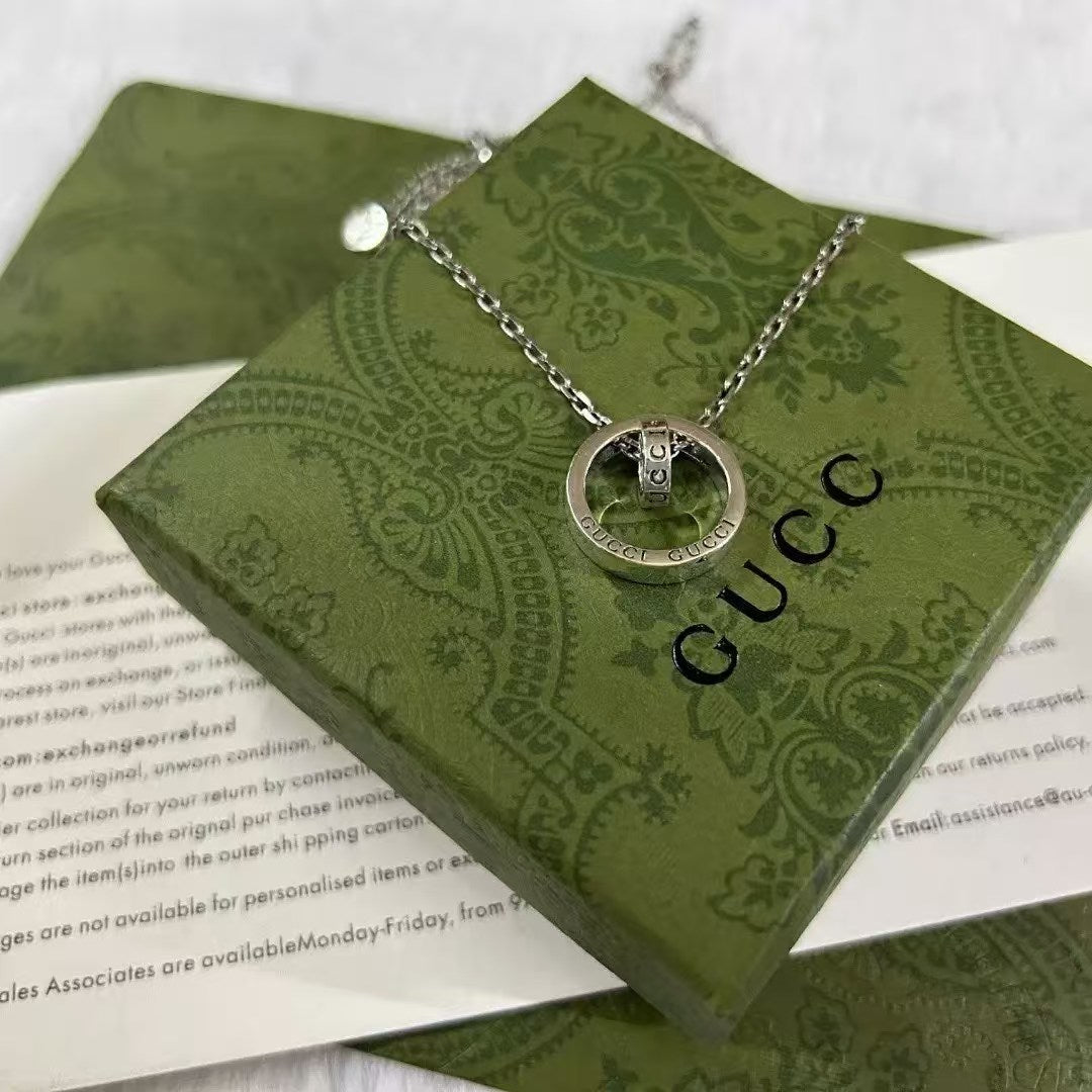 Gucci Silver Circle Pendant Necklace – Vertical Bar Engraving Design