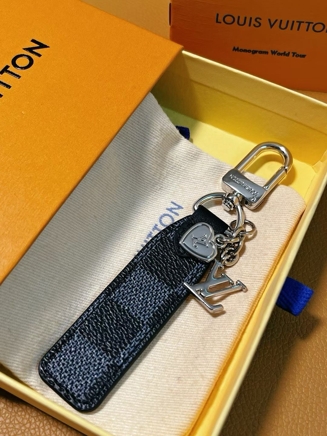 Louis Vuitton Keychain Collection – Monogram & Damier Leather Straps with Engraved Clasps