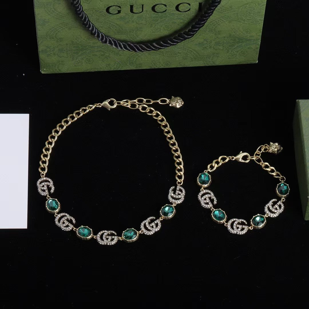 Gucci Green Gemstone Logo Jewelry Set – Gold-Tone Necklace & Bracelet Duo