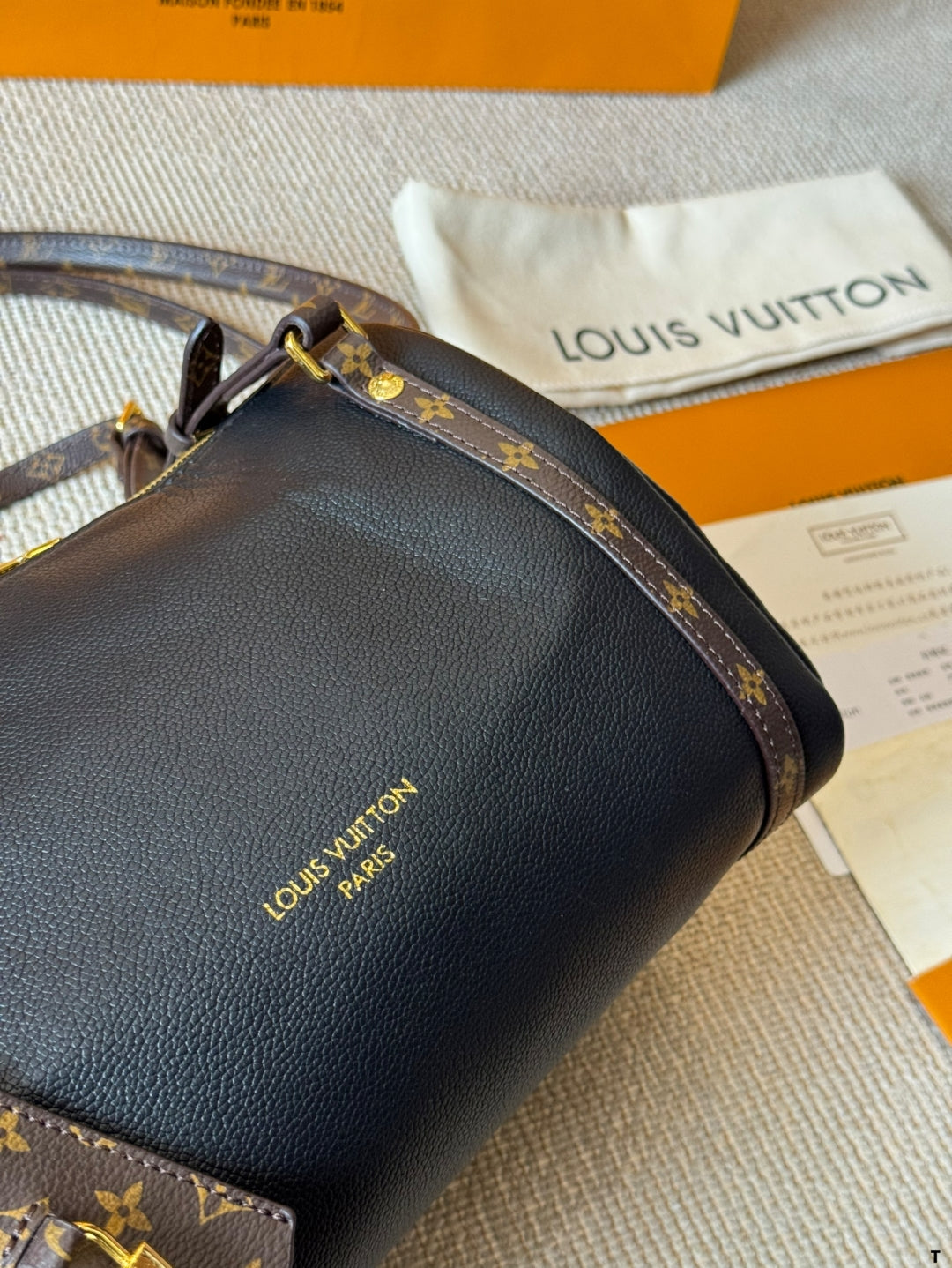 Louis Vuitton Monogram Accent Handbag – Black Leather with Gold Hardware
