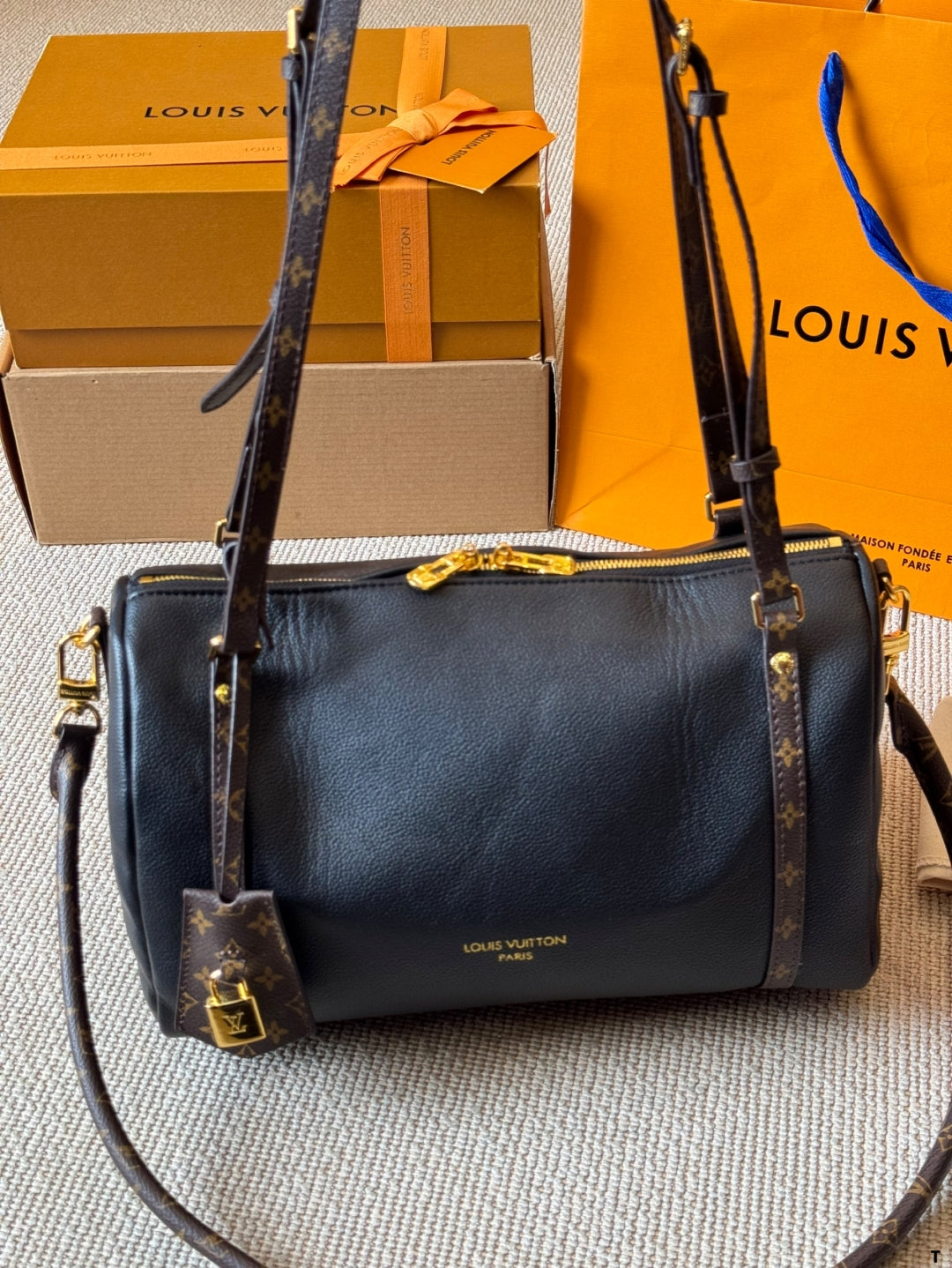 Louis Vuitton Monogram Accent Handbag – Black Leather with Gold Hardware