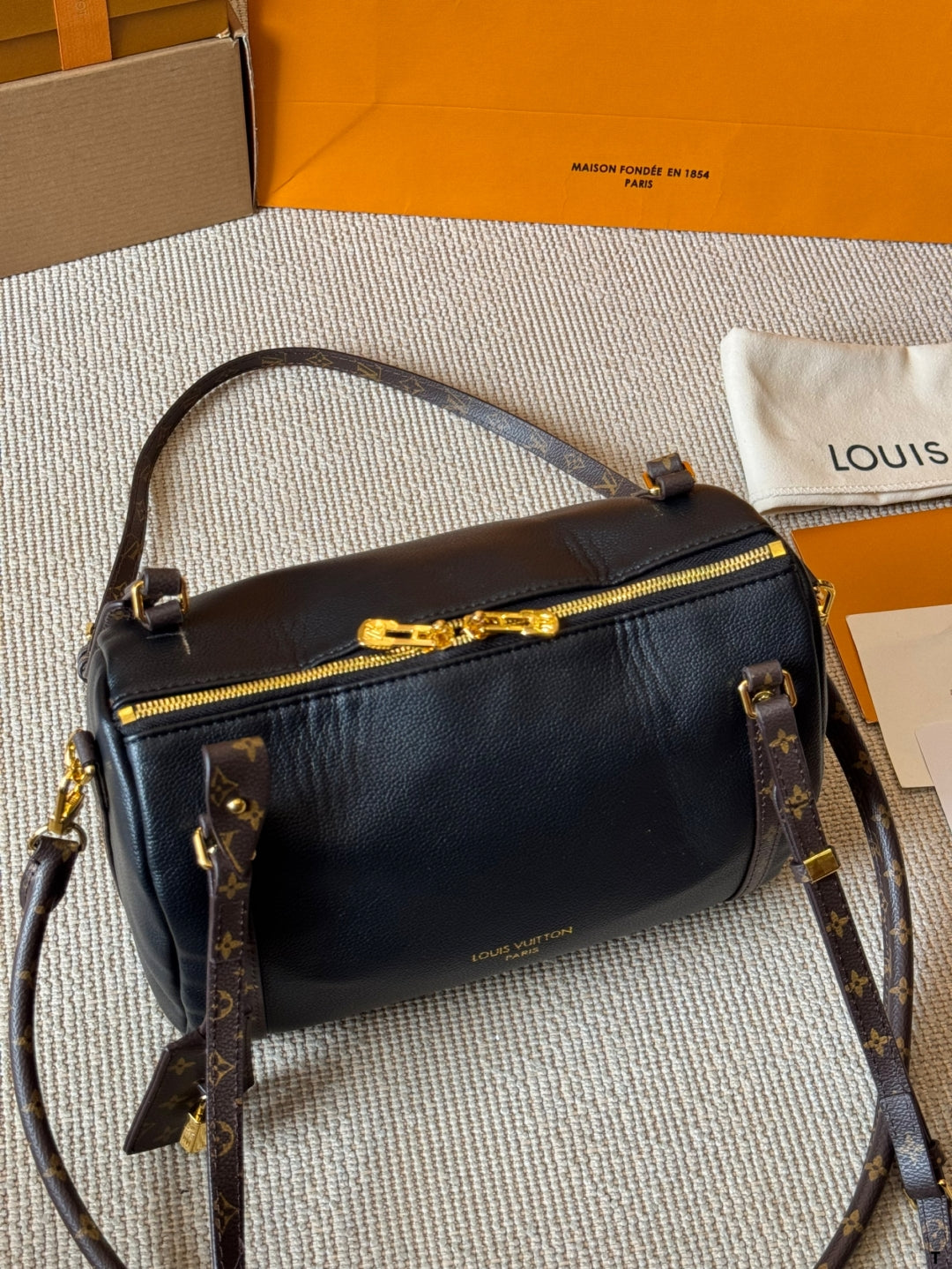 Louis Vuitton Monogram Accent Handbag – Black Leather with Gold Hardware