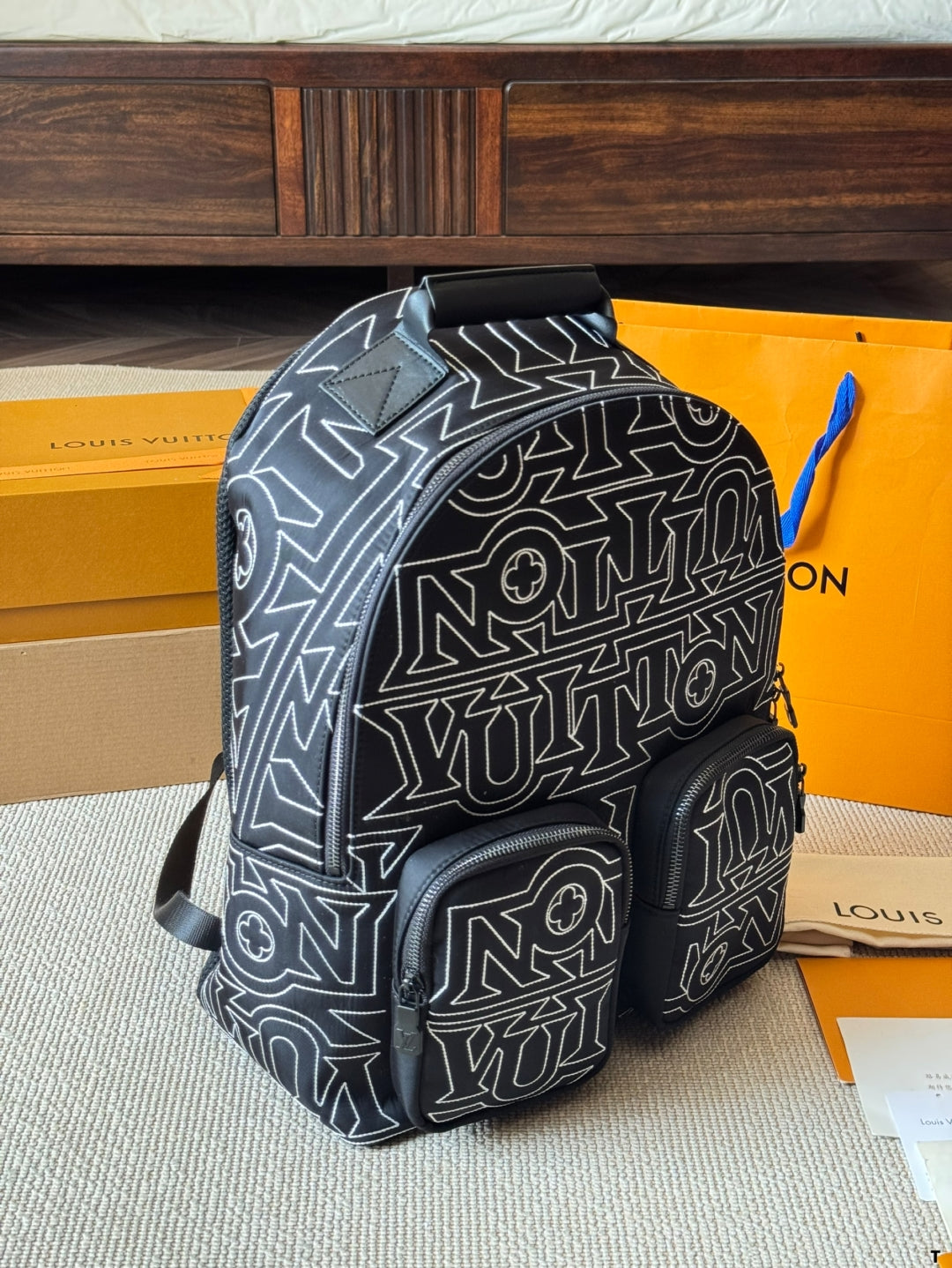 Louis Vuitton Statement Backpack – Black & White Graphic Print with Dual Pockets