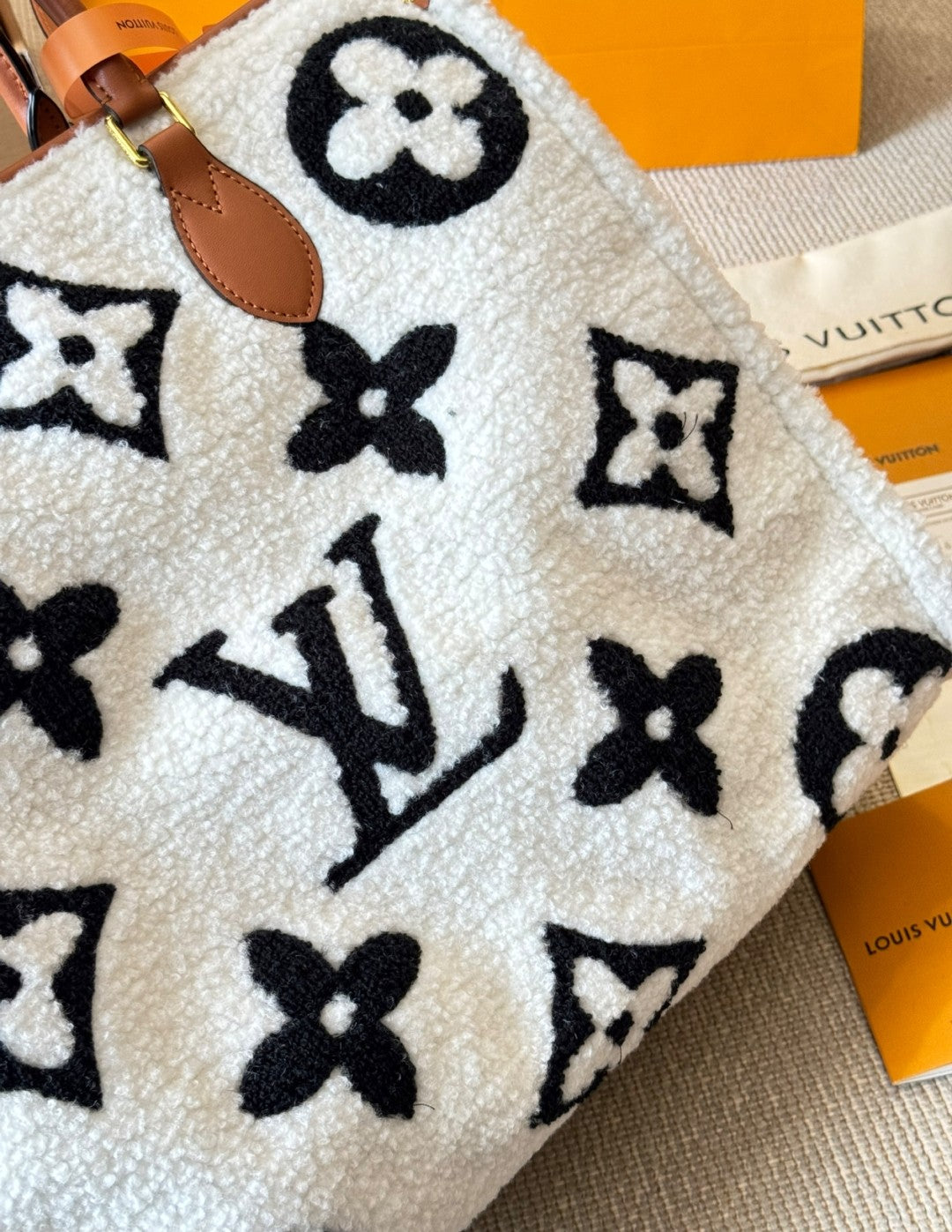 Louis Vuitton patterned product with brand name visible