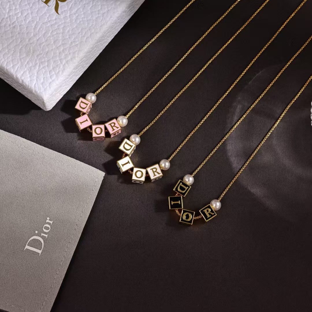 Dior Letter Charm Necklace Collection – Gold-Tone Chains with DIOR Letter Charms & Pearl Detail