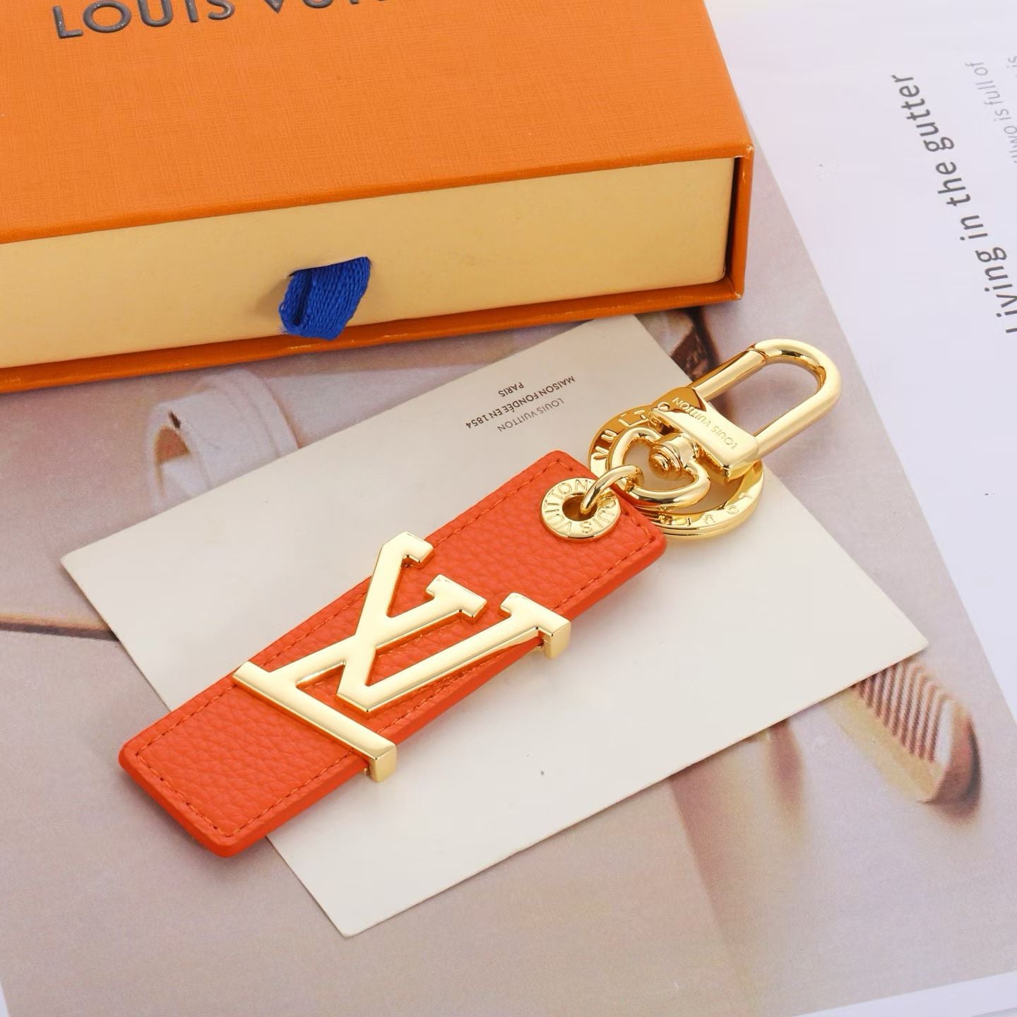 Louis Vuitton LV Logo Keychain – Colorful Leather Strap with Silver Hardware