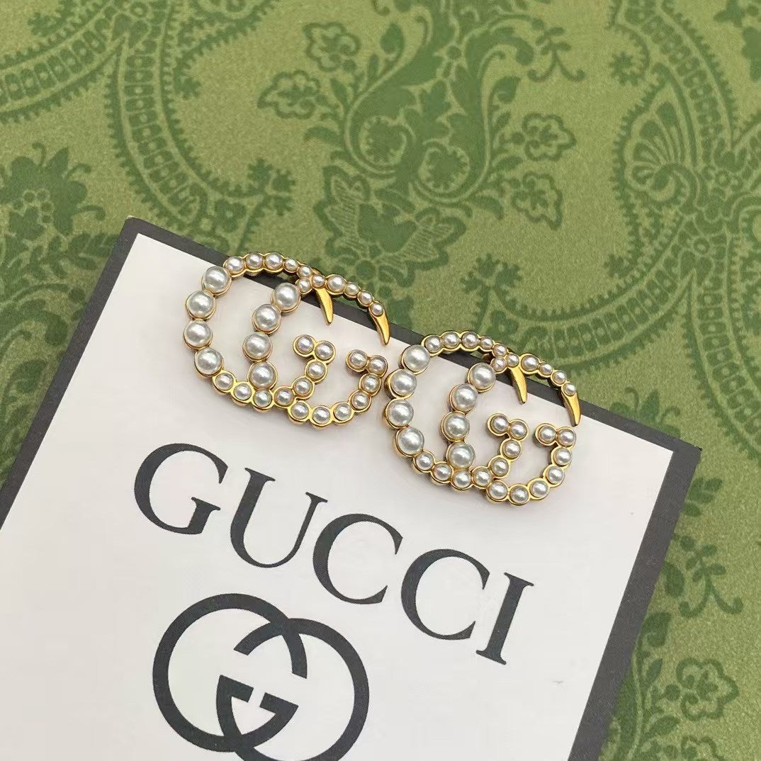 Gucci Pearl GG Logo Earrings – Gold-Tone Interlocking GG with White Pearl Detailing