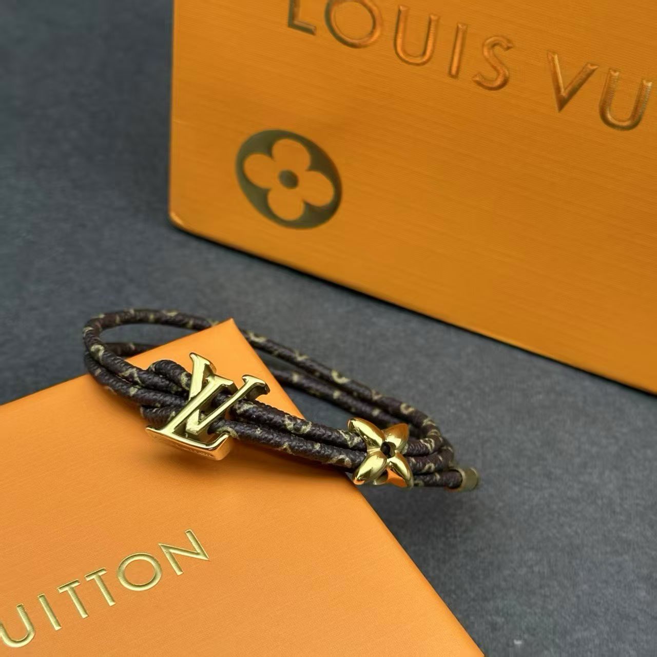 Louis Vuitton Monogram Leather Bracelet – Double Cord with Gold LV Logo & Flower Charm