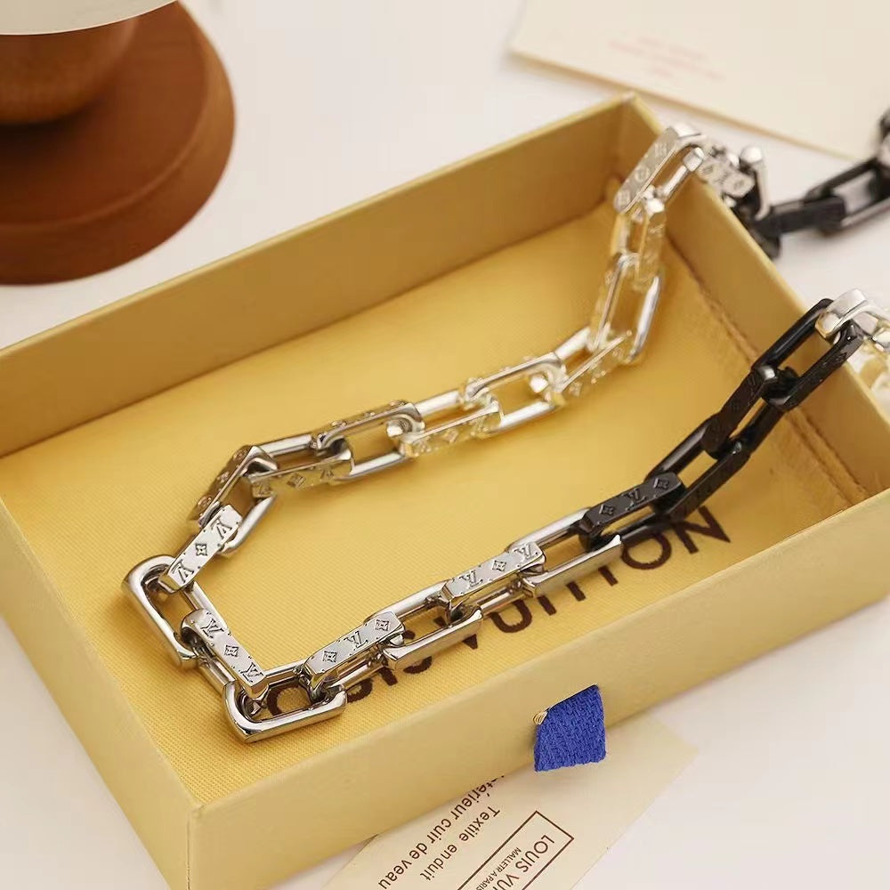 Louis Vuitton Mixed-Metal Chain Necklace – Silver, Gold & Black Links with LV Engraving