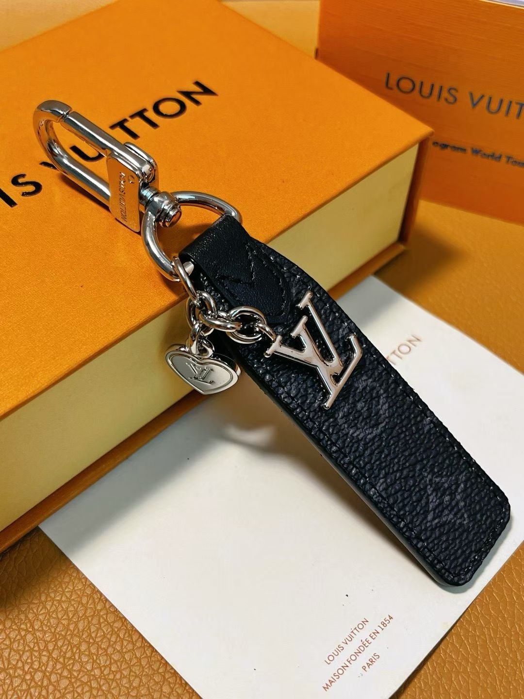 Louis Vuitton Keychain Collection – Monogram & Damier Leather Straps with Engraved Clasps
