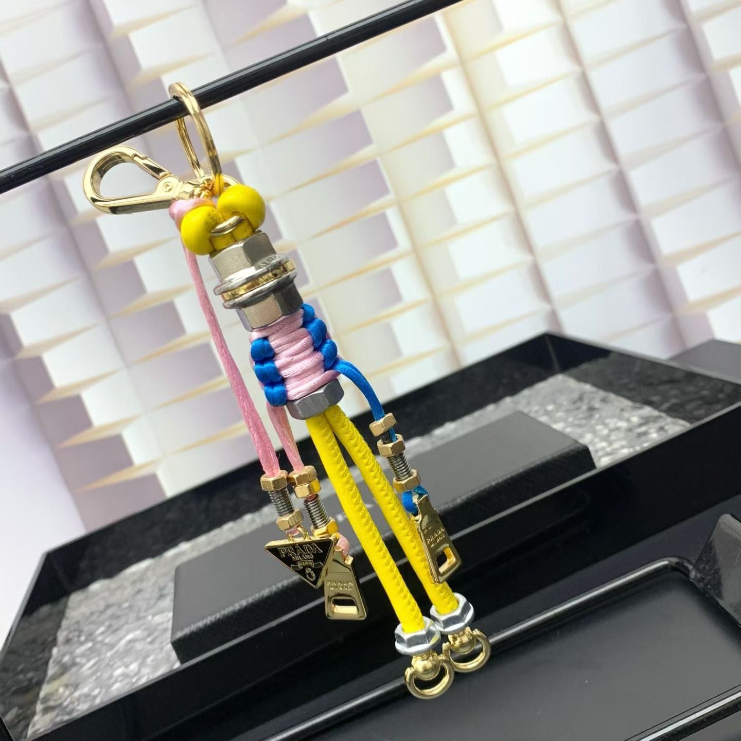 Prada Humanoid Keychain Multicolor Cord Figures with Gold Hardware & Logo Charm