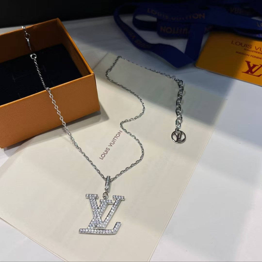 Louis Vuitton LV Pendant Necklace Trio – Gold & Silver Chains with Gem-Encrusted Logo Pendants