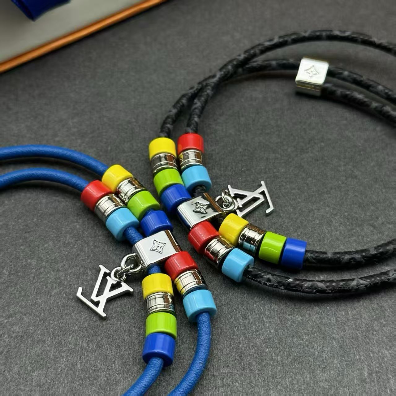 Louis Vuitton Cord Bracelet Multicolor Beads with Silver LV Logo Charm