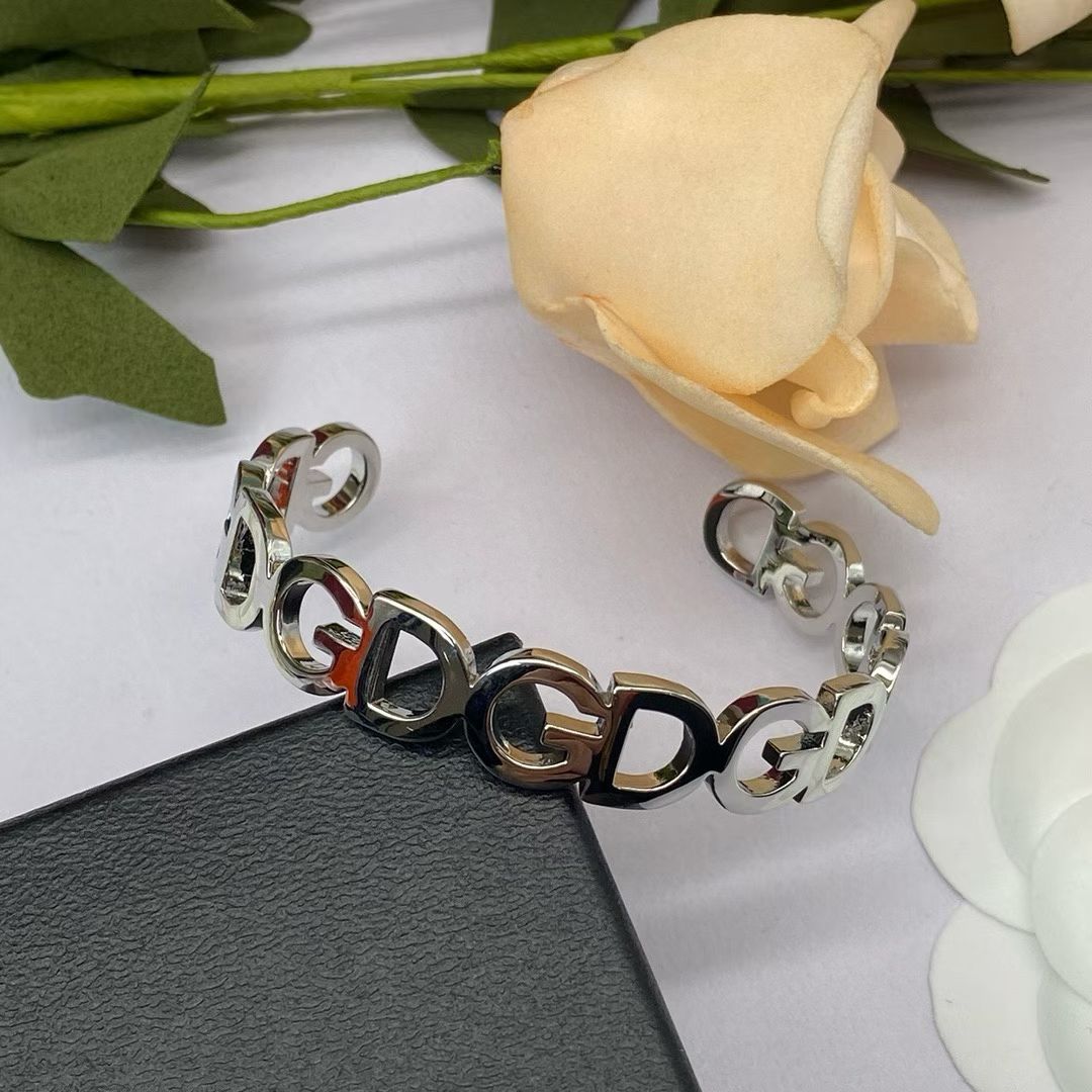 Dolce & Gabbana GD Link Bracelet – Polished Gold & Silver Open Cuff Design